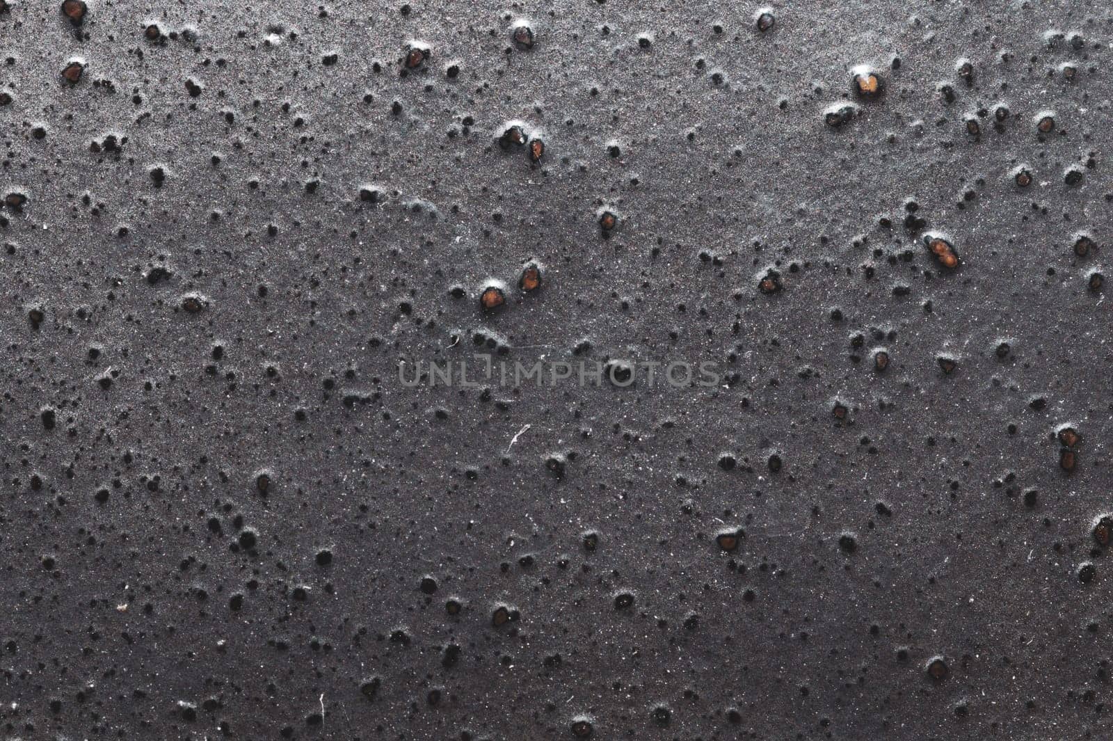 Grunge texture. gray wall close up. rough background. stone surface with spots