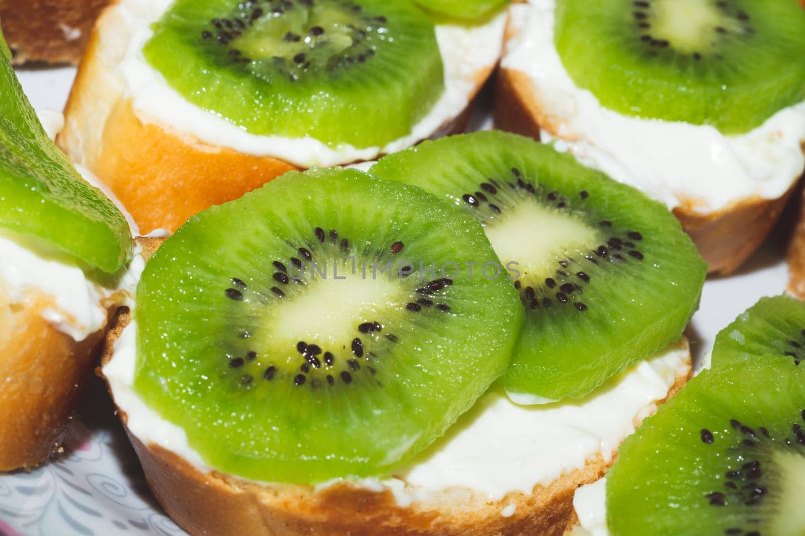 Sandwiches with kiwi. bread with fruit slices. background with appetizer