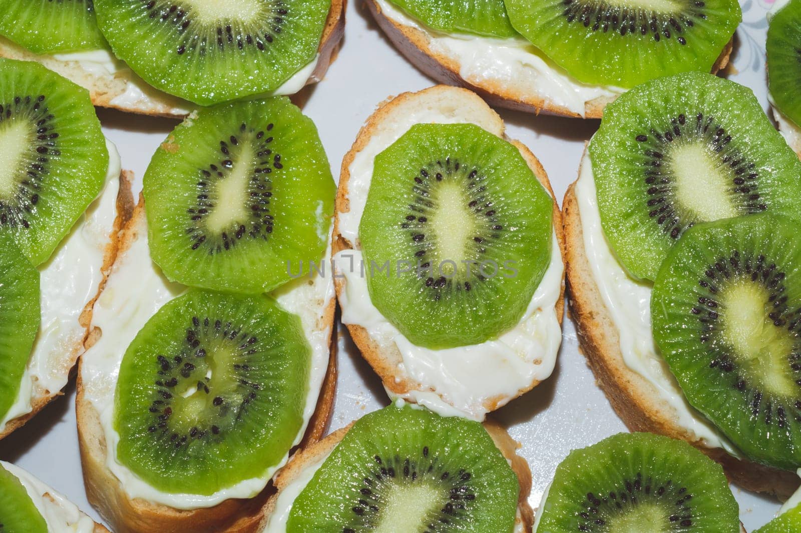 Sandwiches with kiwi. bread with fruit slices. background with appetizer