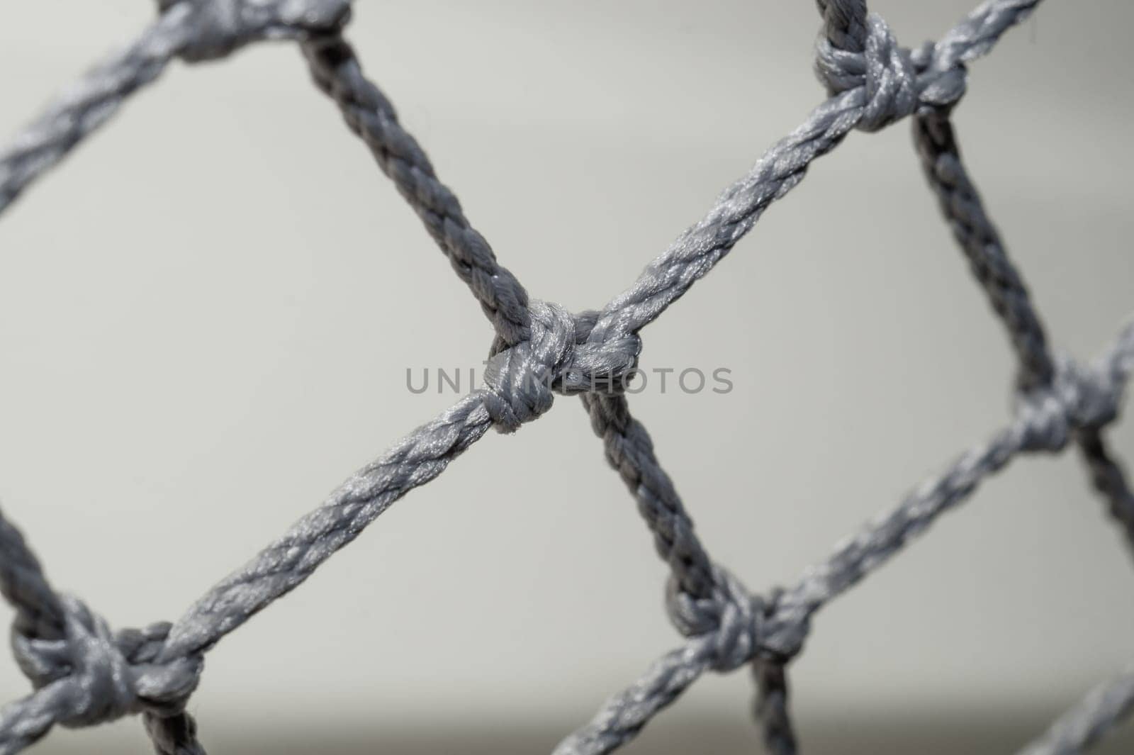 Rope net close up. mesh with knots and weaving