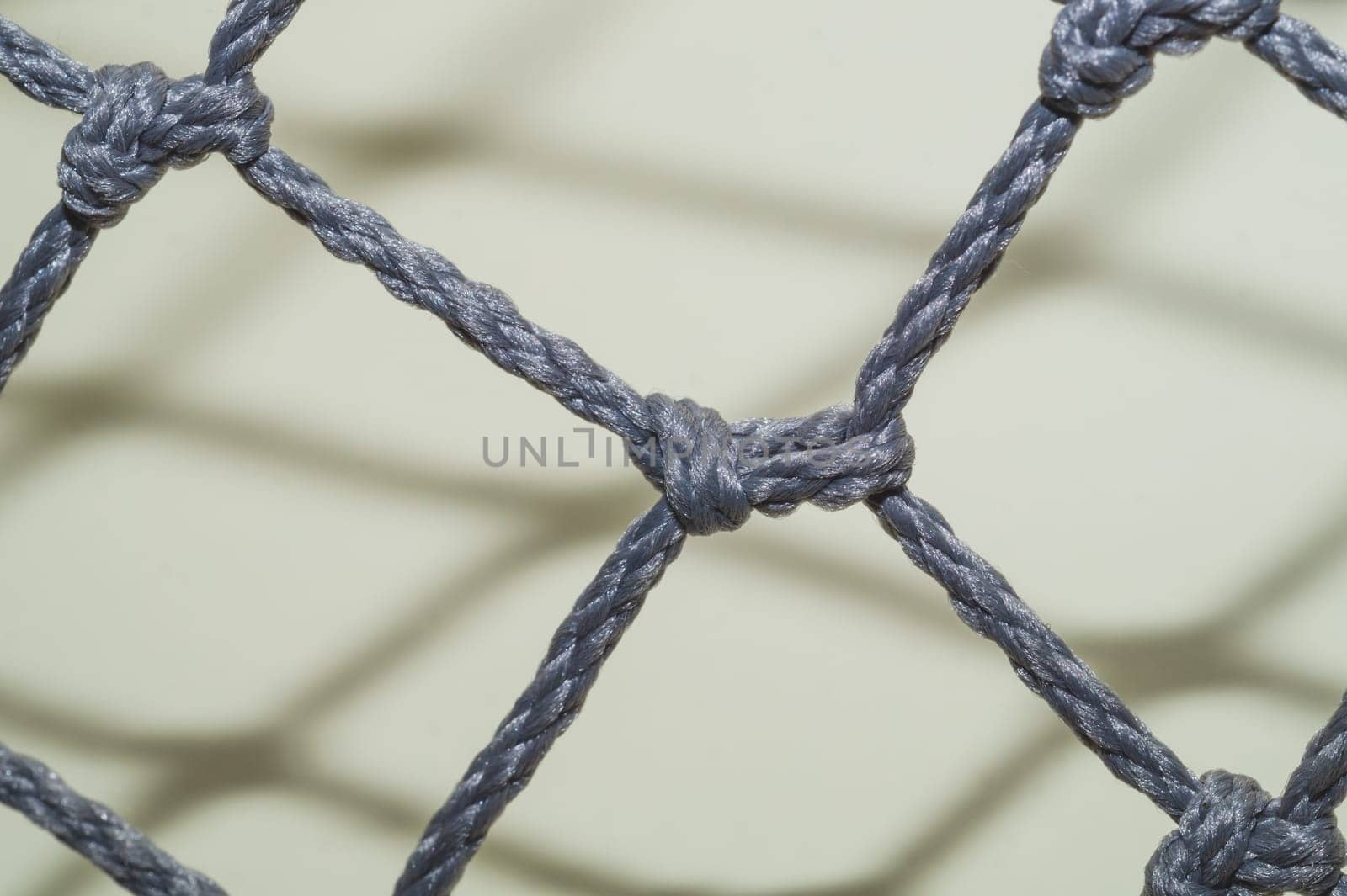 Rope net close up. mesh with knots and weaving