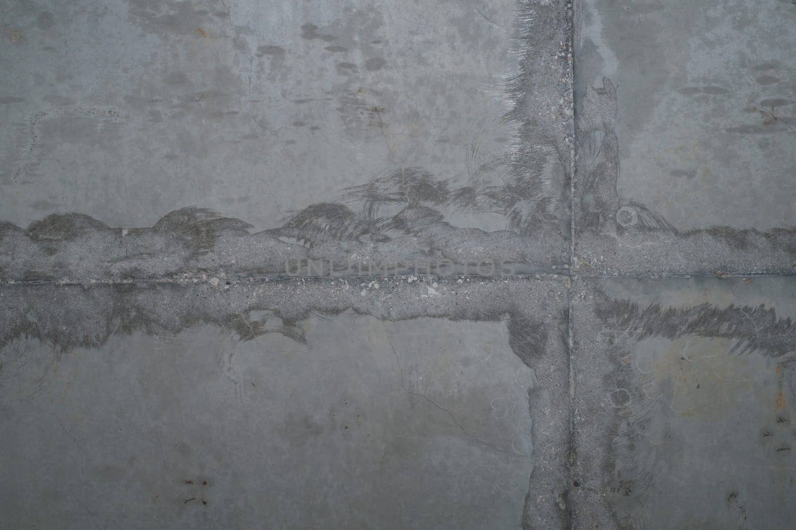 Concrete wall with cracks and scratches. abstract gray background with patterns. wall is ready for renovation works