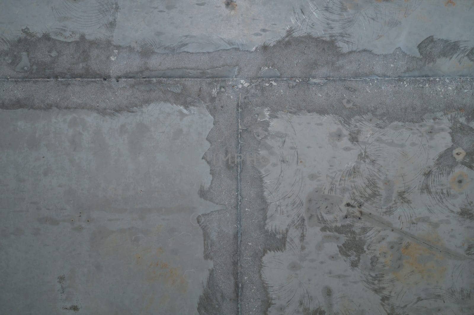 Concrete wall with cracks and scratches. abstract gray background with patterns. wall is ready for renovation works