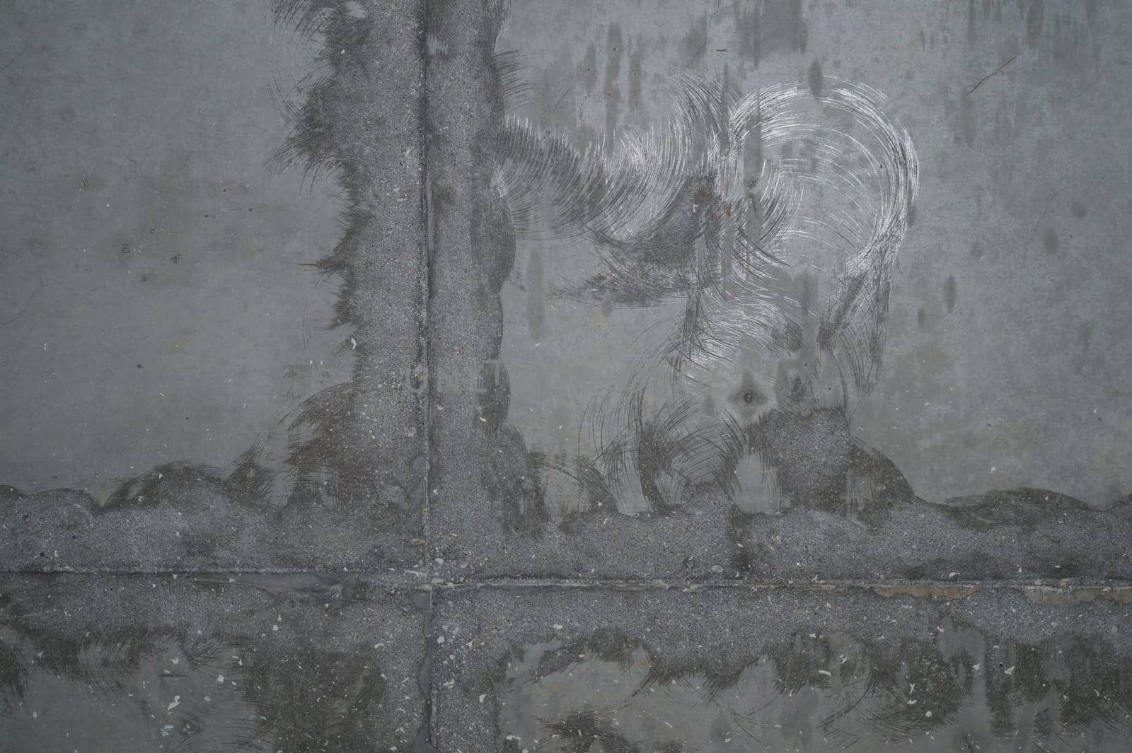 Concrete wall with cracks and scratches. abstract gray background with patterns. wall is ready for renovation works
