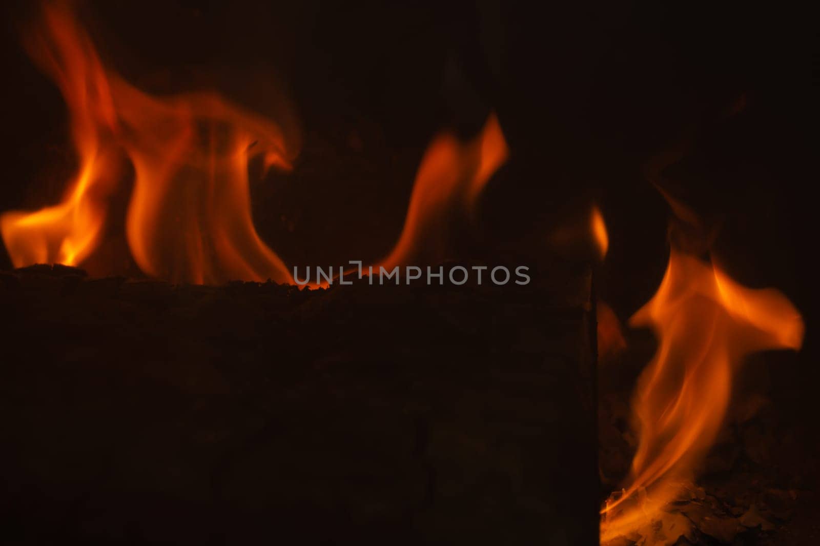 Burning wood in the fire. flame in the fireplace