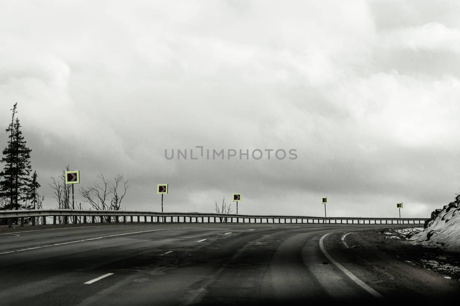 Roadway turn with road signs. highway background