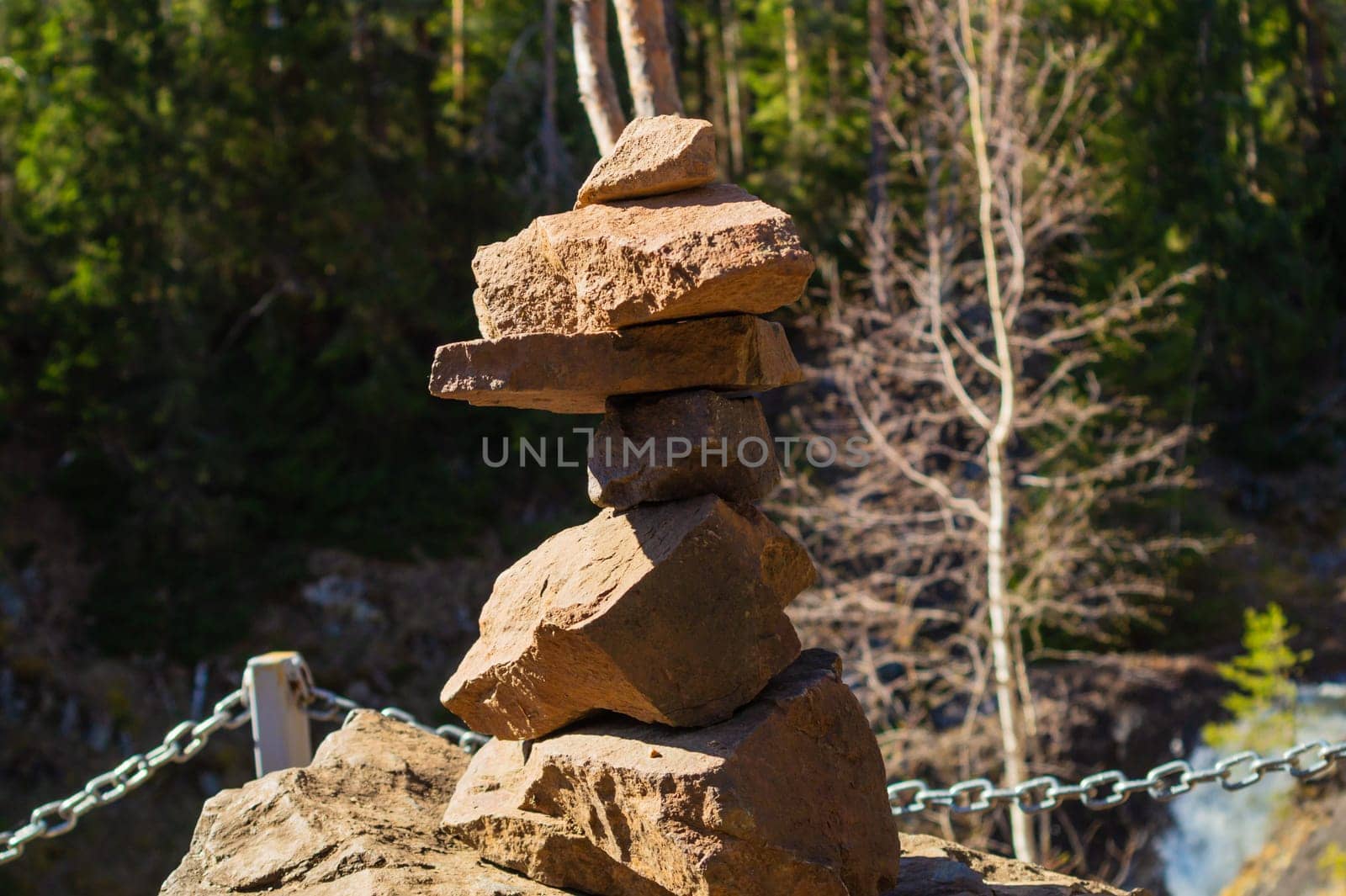 Stones in equilibrium. pile of rocks in the woods. stack of stones in the park