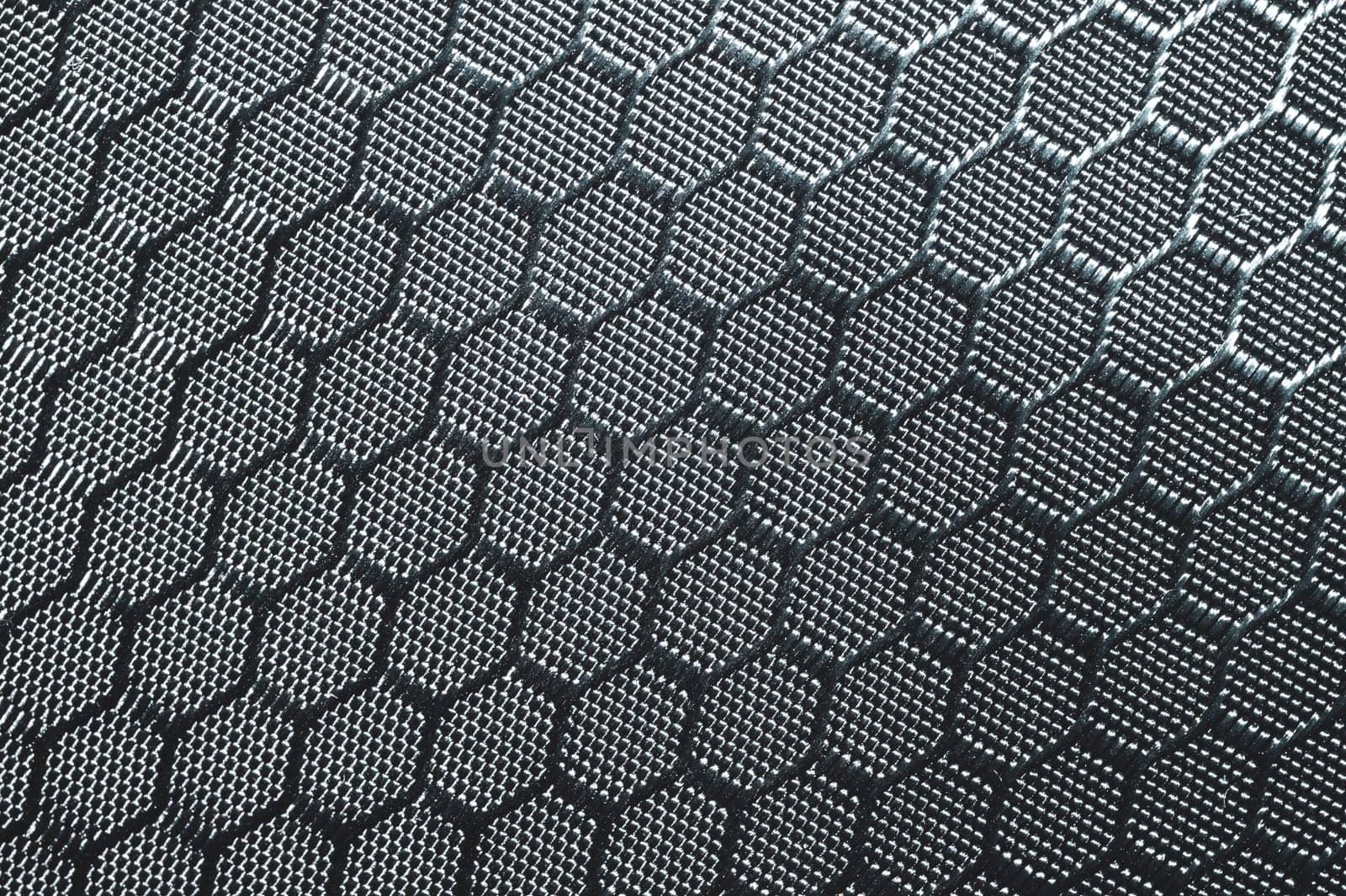 Fabric texture with hex shaped cells. textile background. woven material