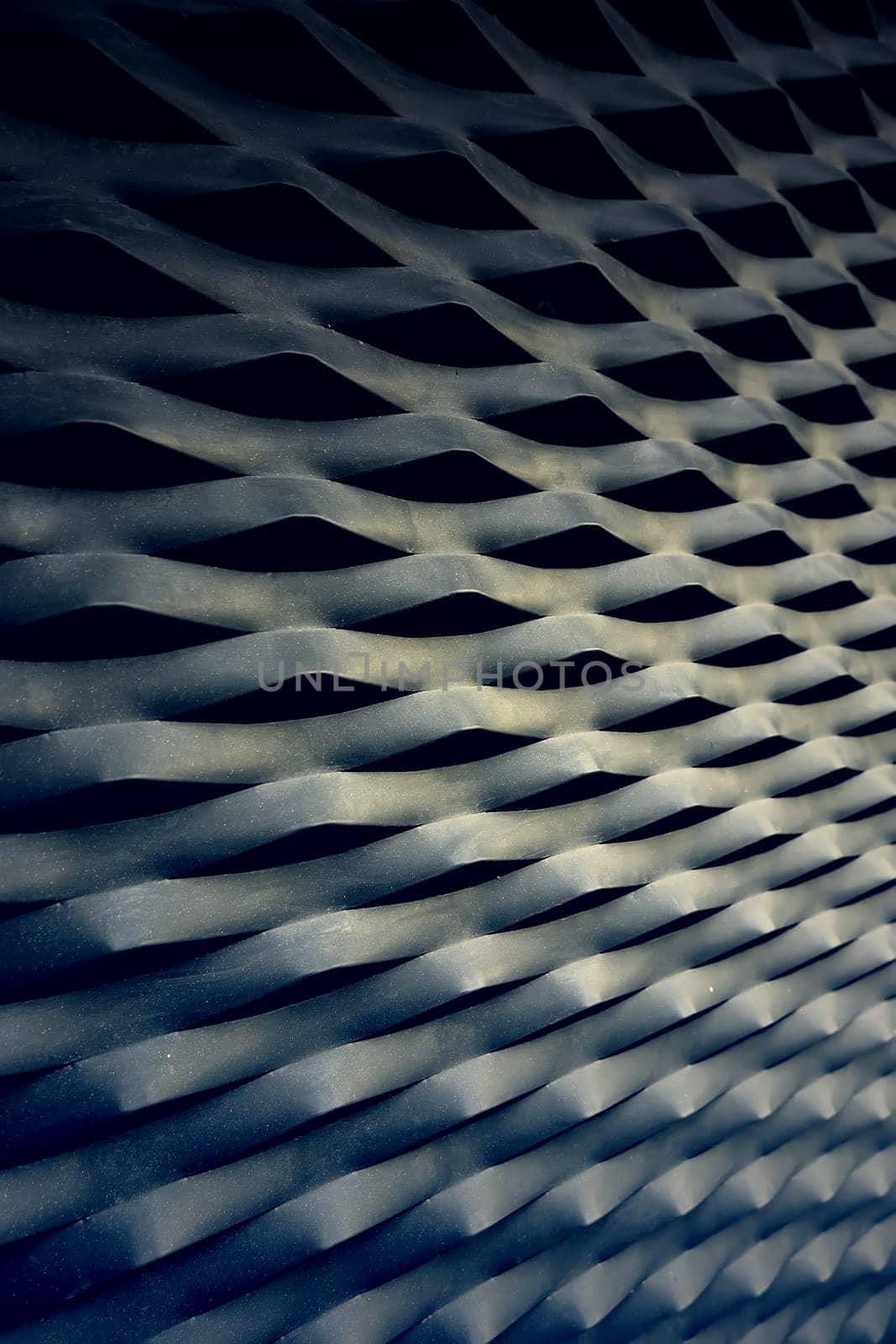 Detail of metal protection fence decorated, painted steel with shapes