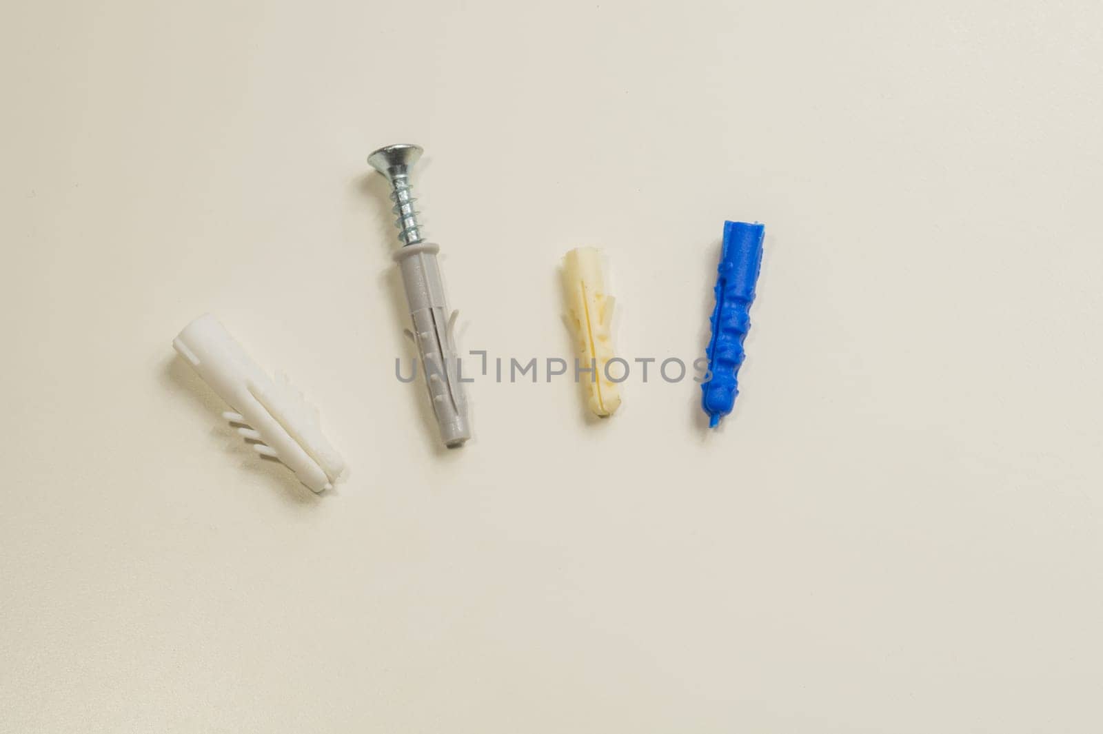 Steel screw on a white background. working tools