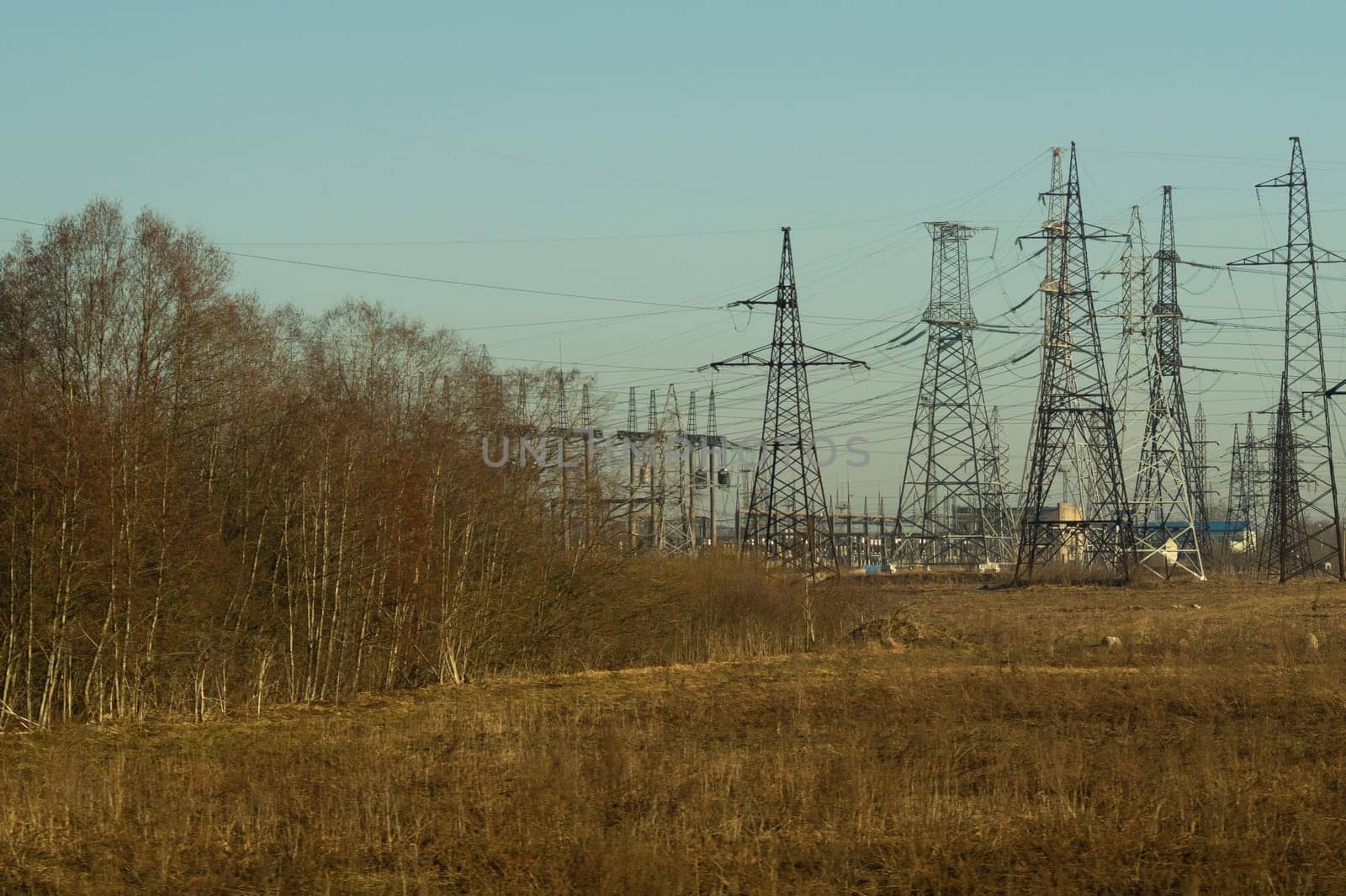 Power line posts. high voltage tower with the sky. industrial background