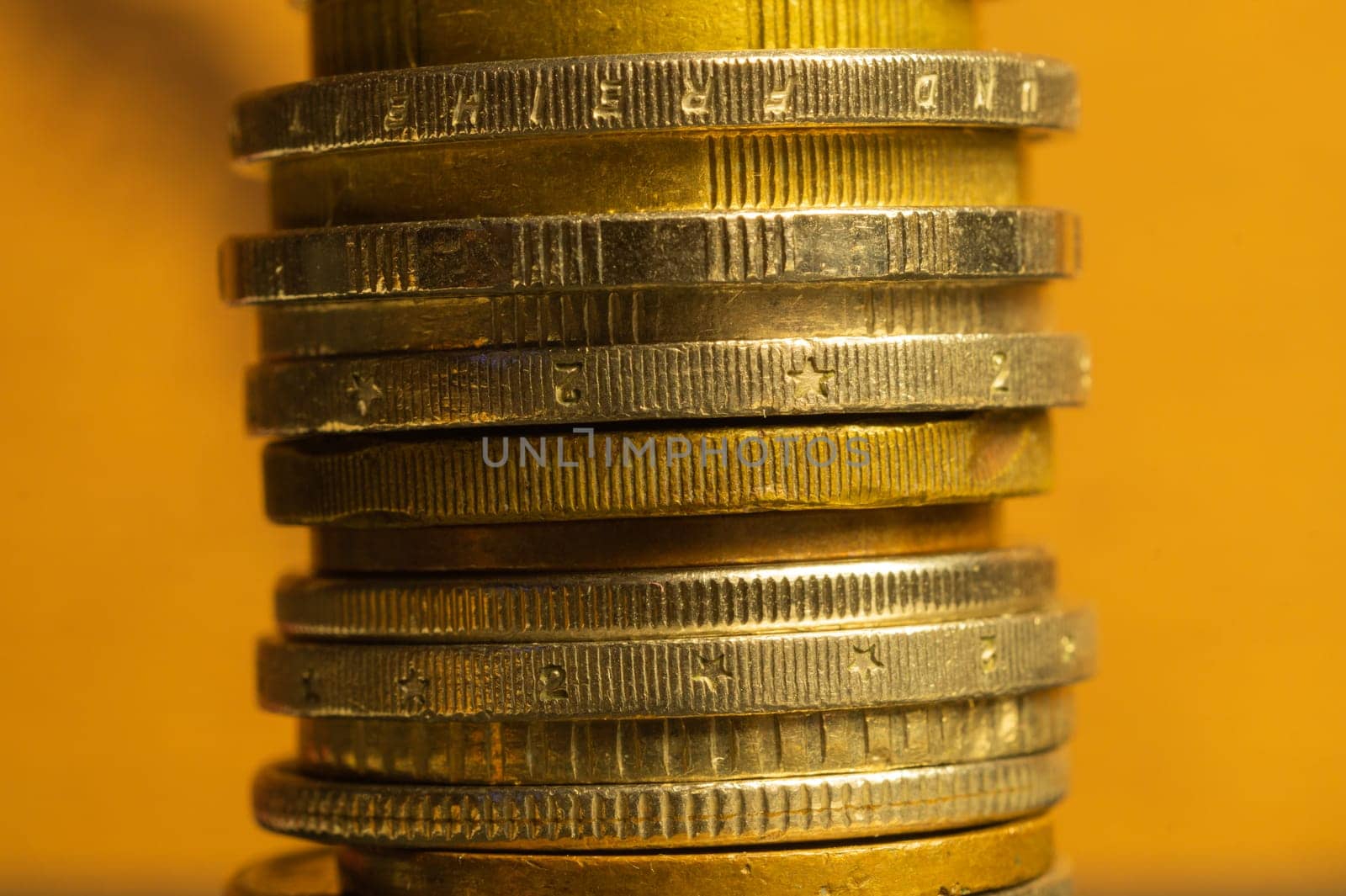 Stack of different coins macro