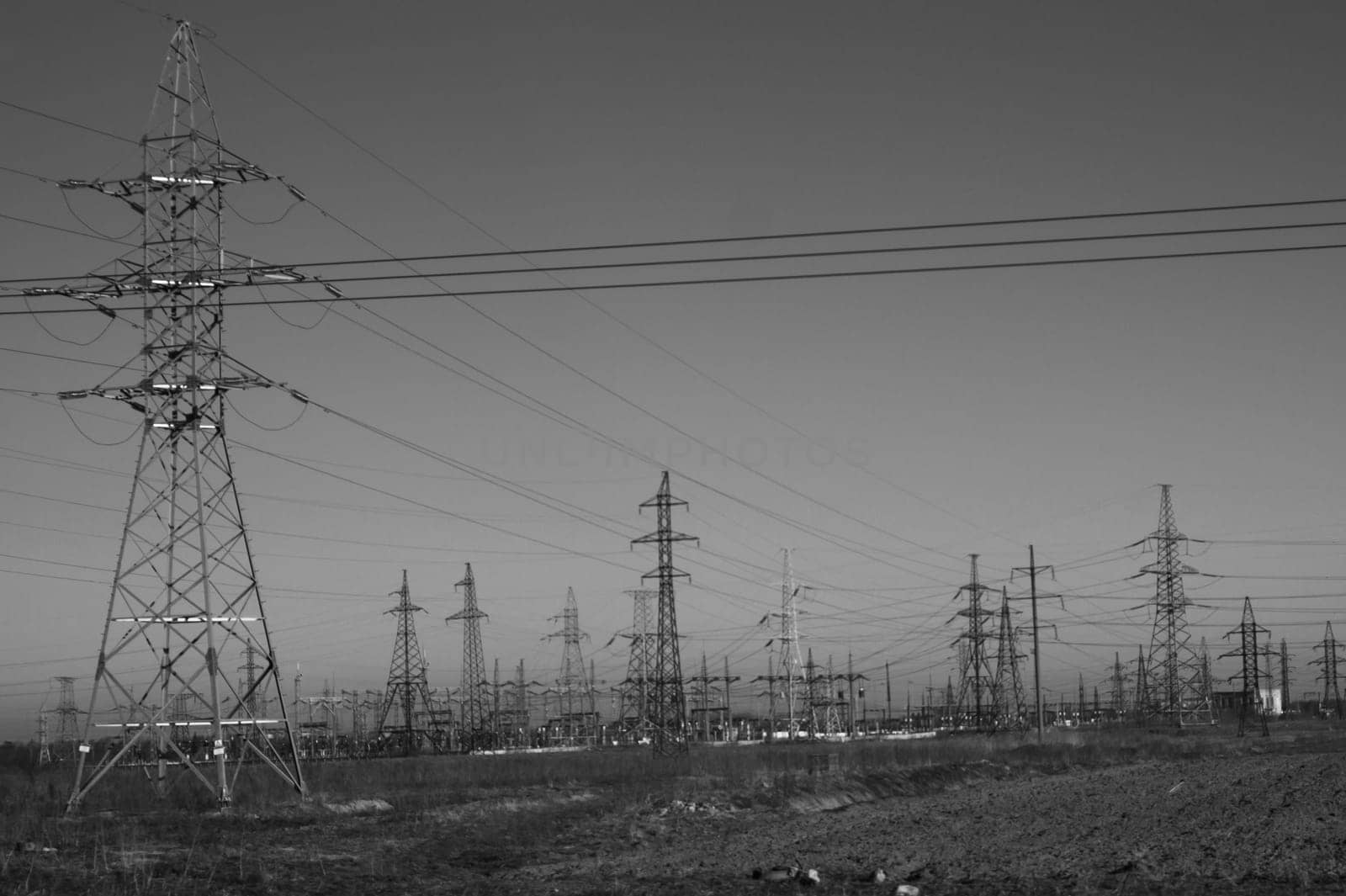 Power line posts. high voltage tower with the sky. industrial background