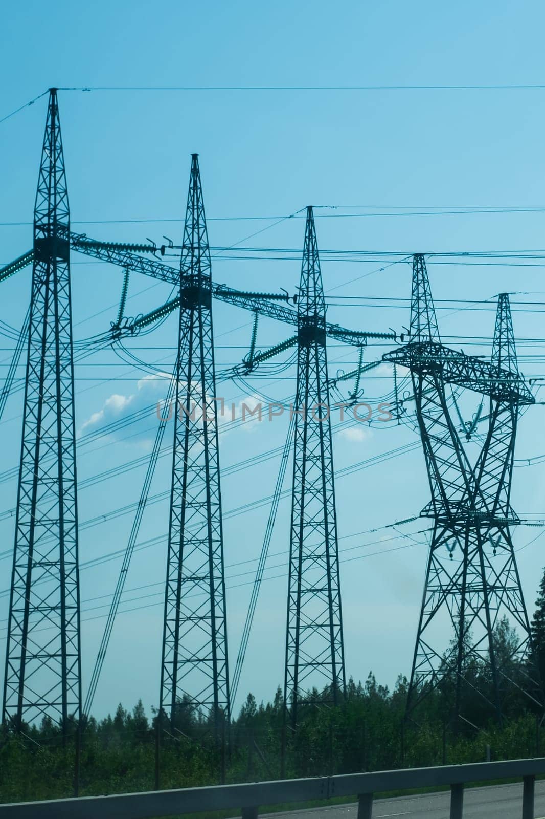 Power line posts. high voltage tower with the sky. industrial background