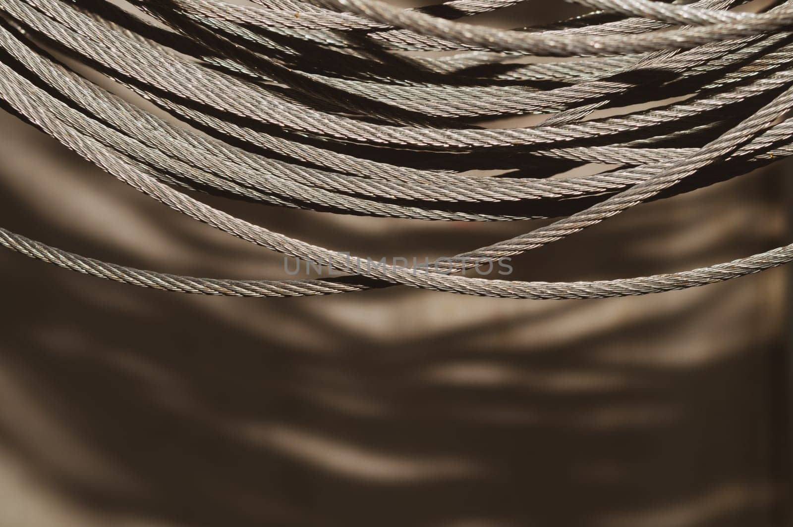 Steel cable. hank of metal rope. working tool