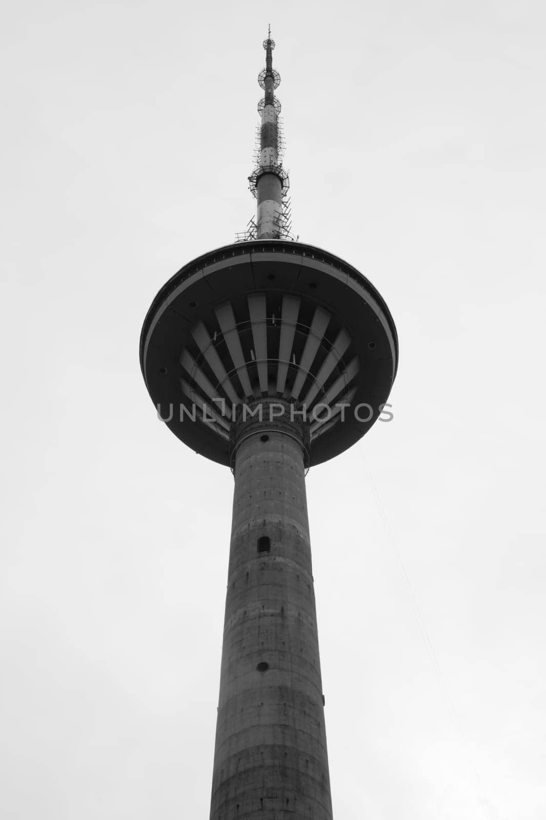 Telecommunication tower. high radio antenna. big metal construction black and white