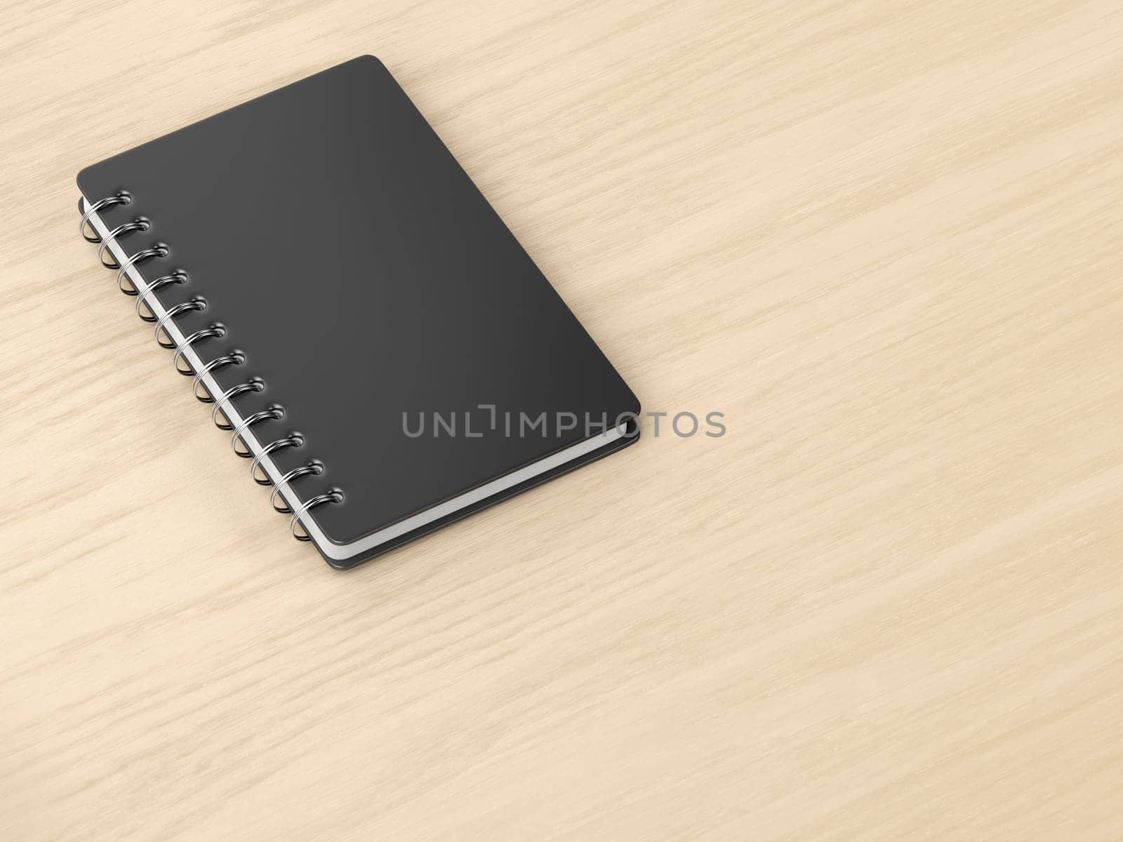 Spiral notebook on wooden desk