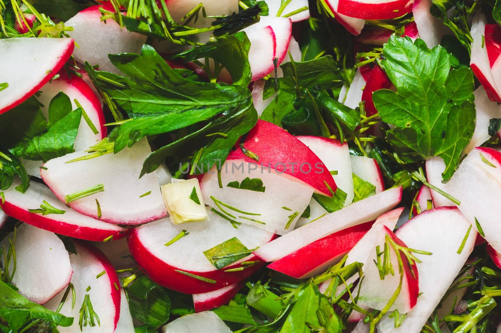 Spring salad with radish and greenery. vegetarian food. healthy eating