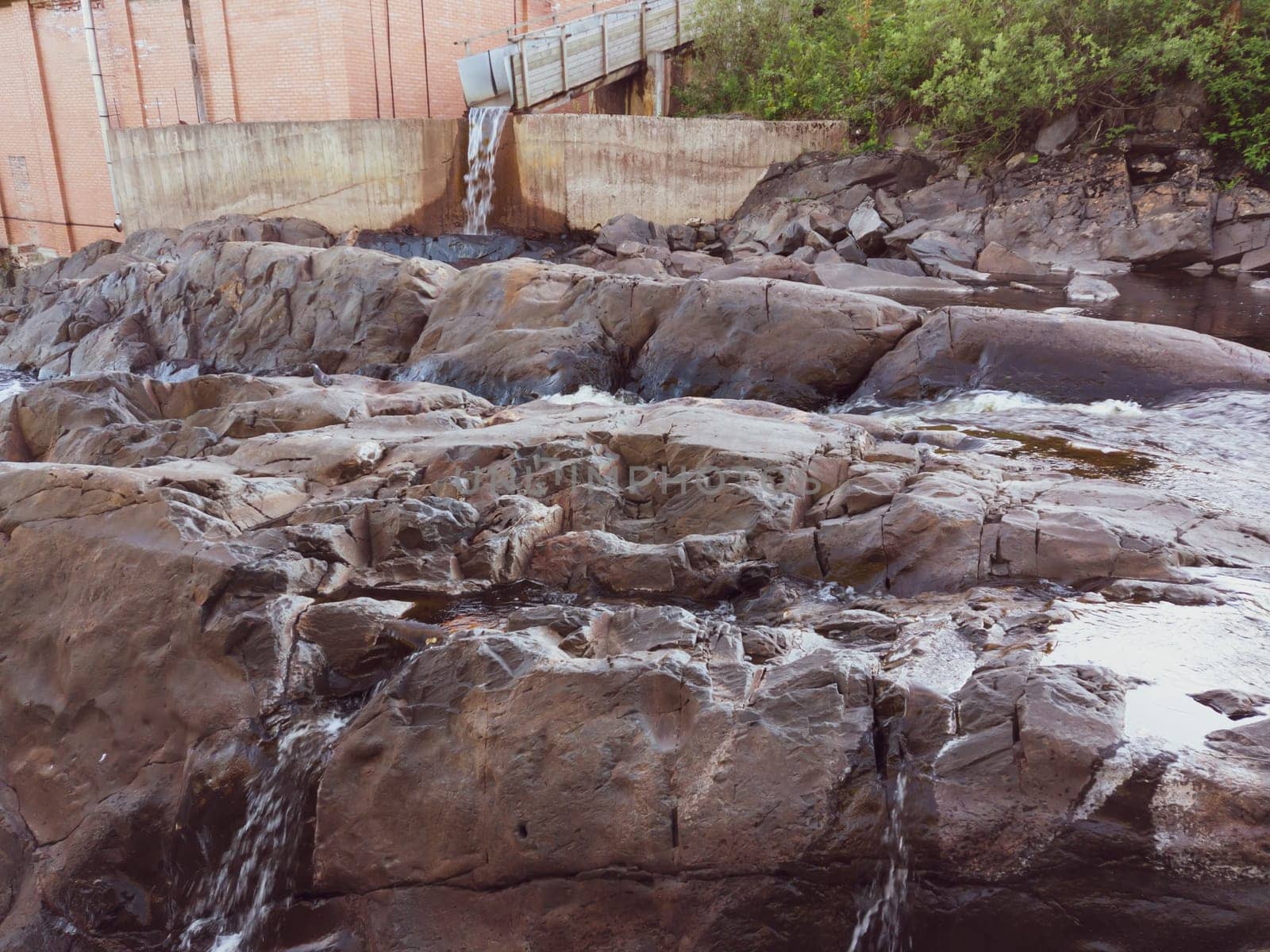 River flows among the rocks. water streaming between the stones