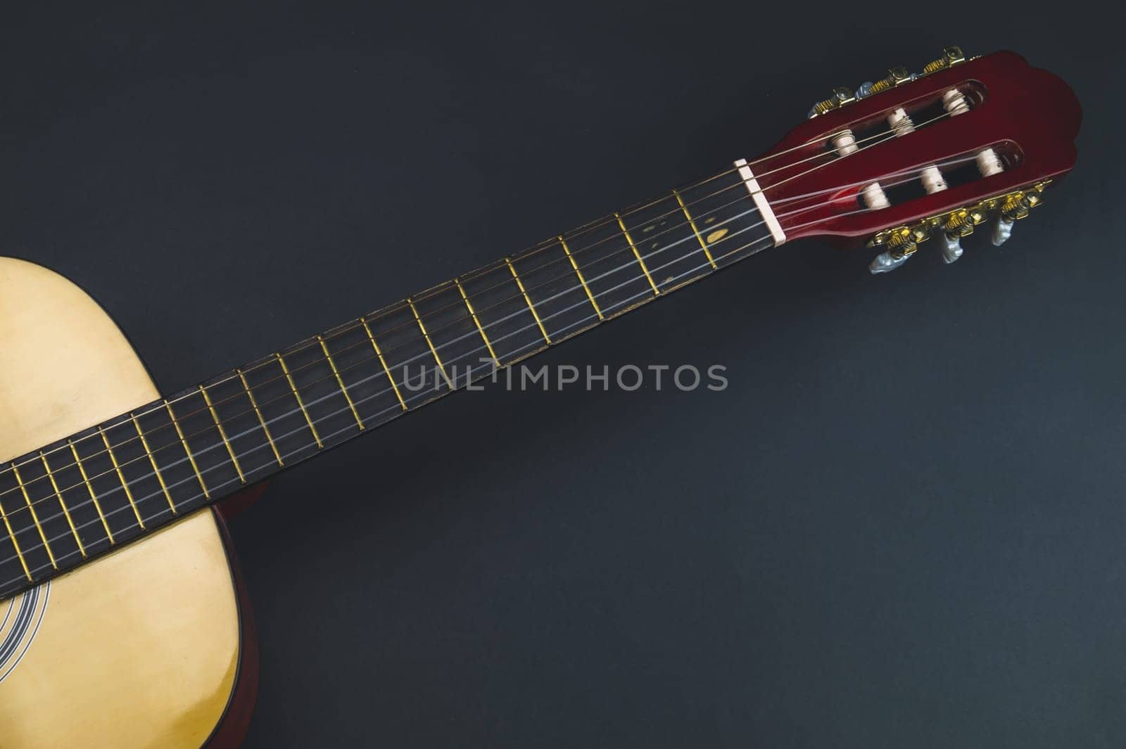 Guitar close up. musical instrument. strings on the guitar fretboard