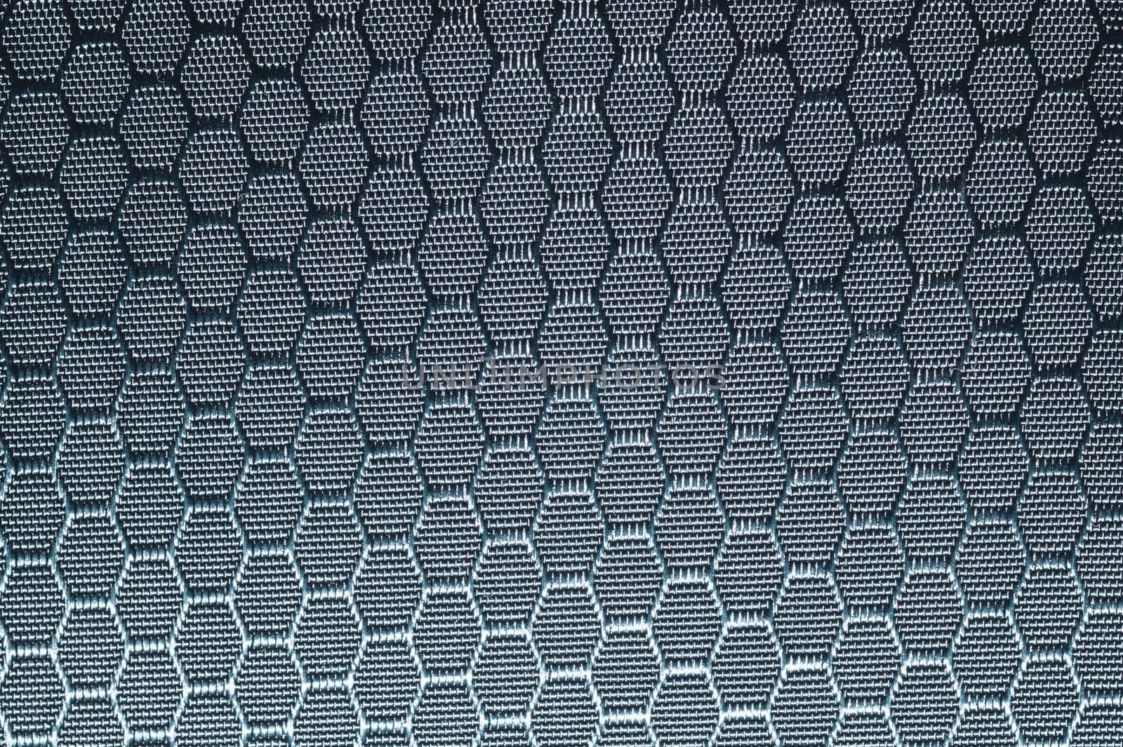 Fabric texture with hex shaped cells. textile background. woven material