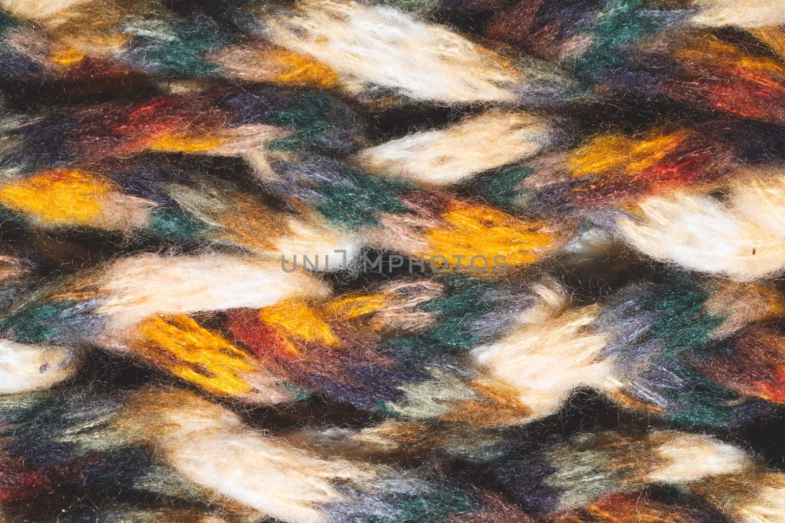 Colorful wool yarn. woolen fabric background. knitted textile close up