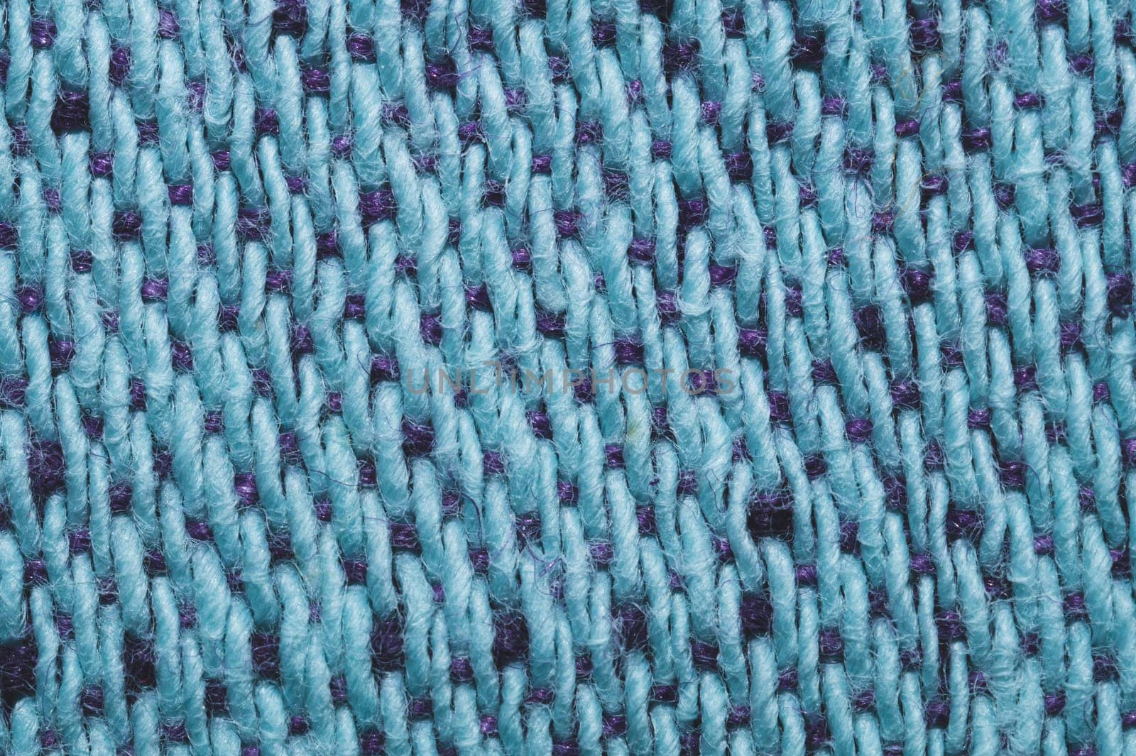 Blue fabric texture. knitted textile background. woven material close up