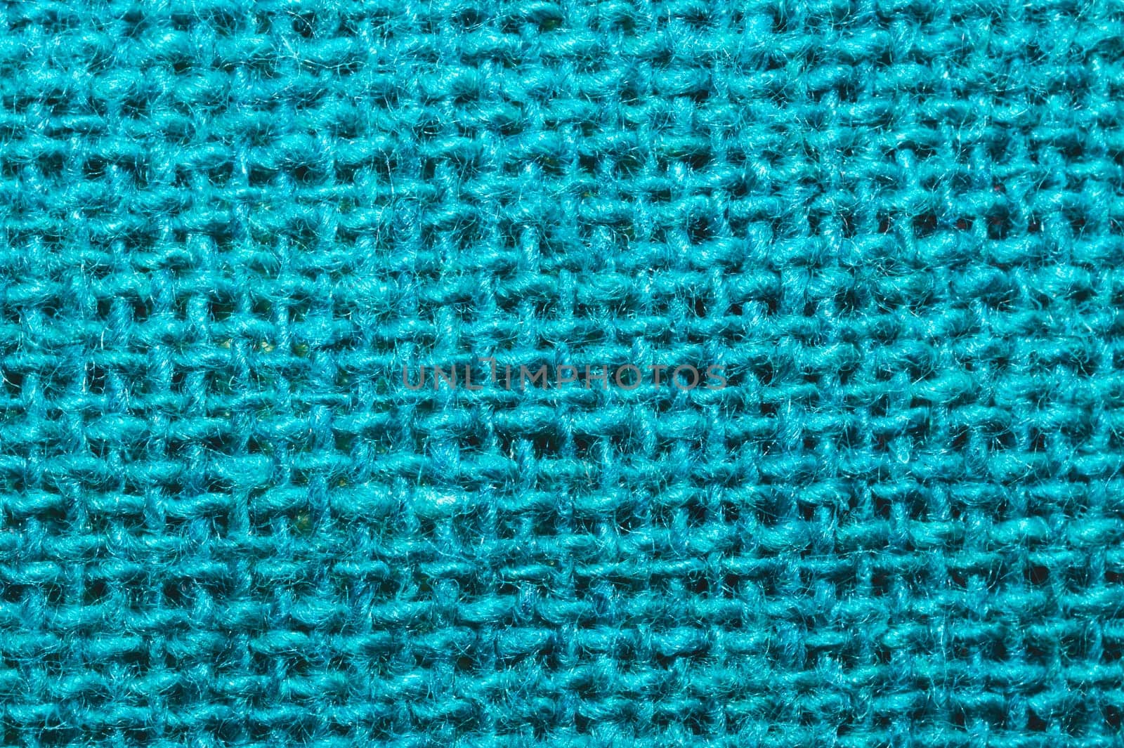 Blue fabric texture. knitted textile background. woven material close up