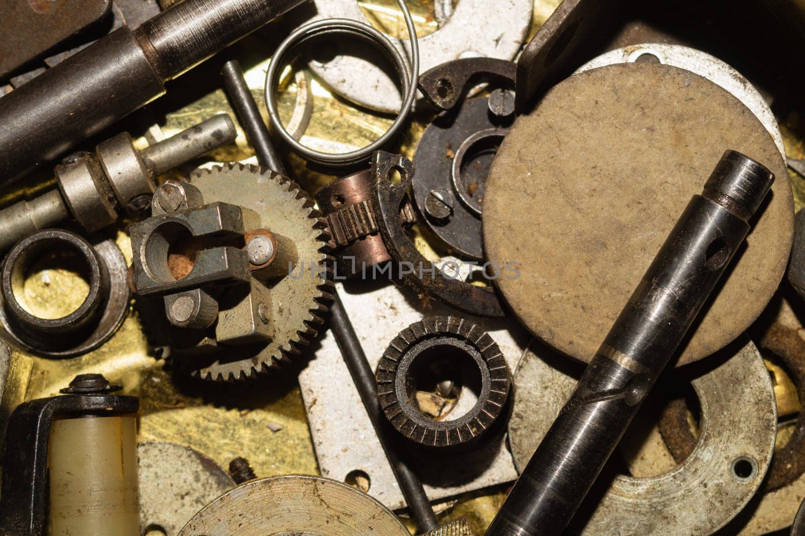 Pile of fasteners and screws close up. scrap metal. different metal parts