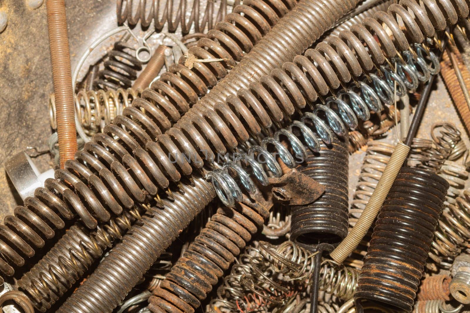 Metal rusty springs. pile of absorbers. industrial concept. work tool