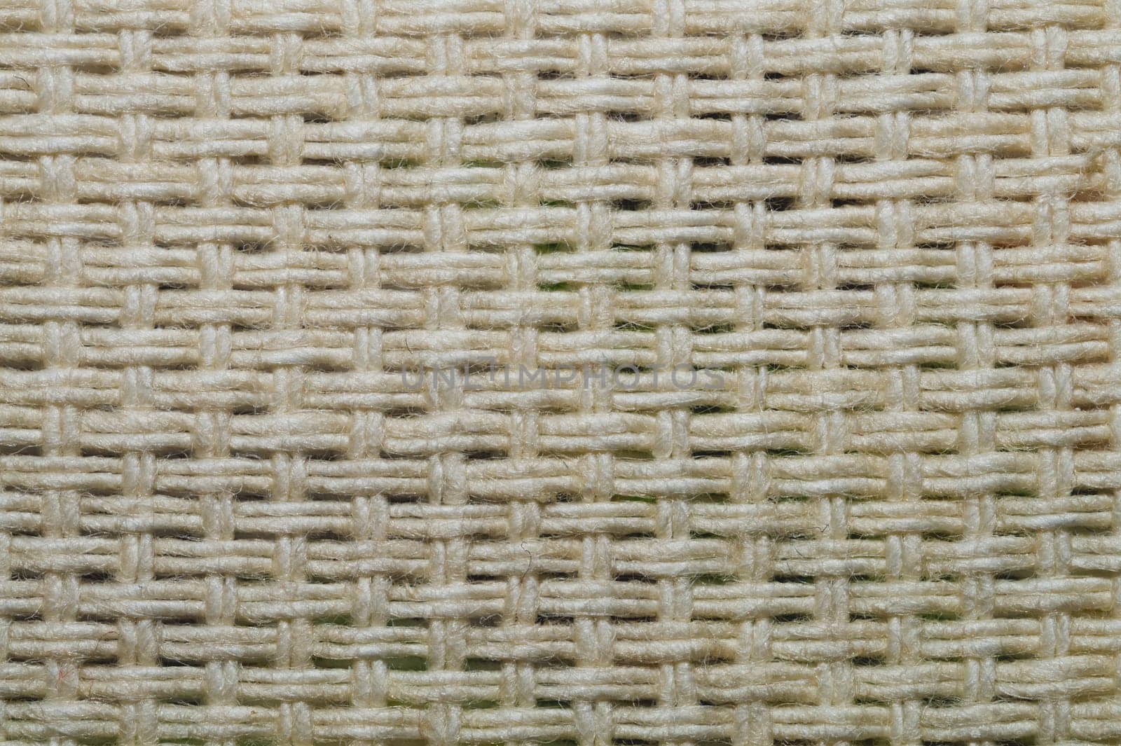Fabric macro texture. knitted material close up. woven background. woolen textile