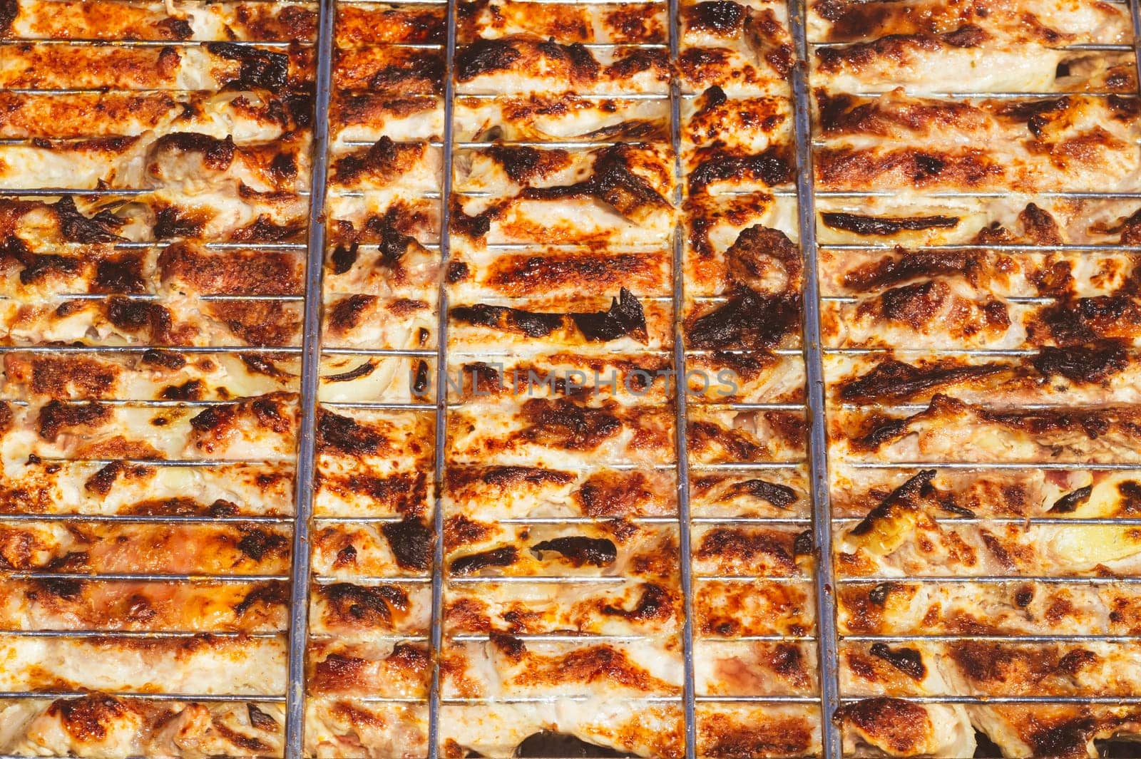 Grilled meat. barbeque on metal grille. picnic with bbq. outdoor cooking