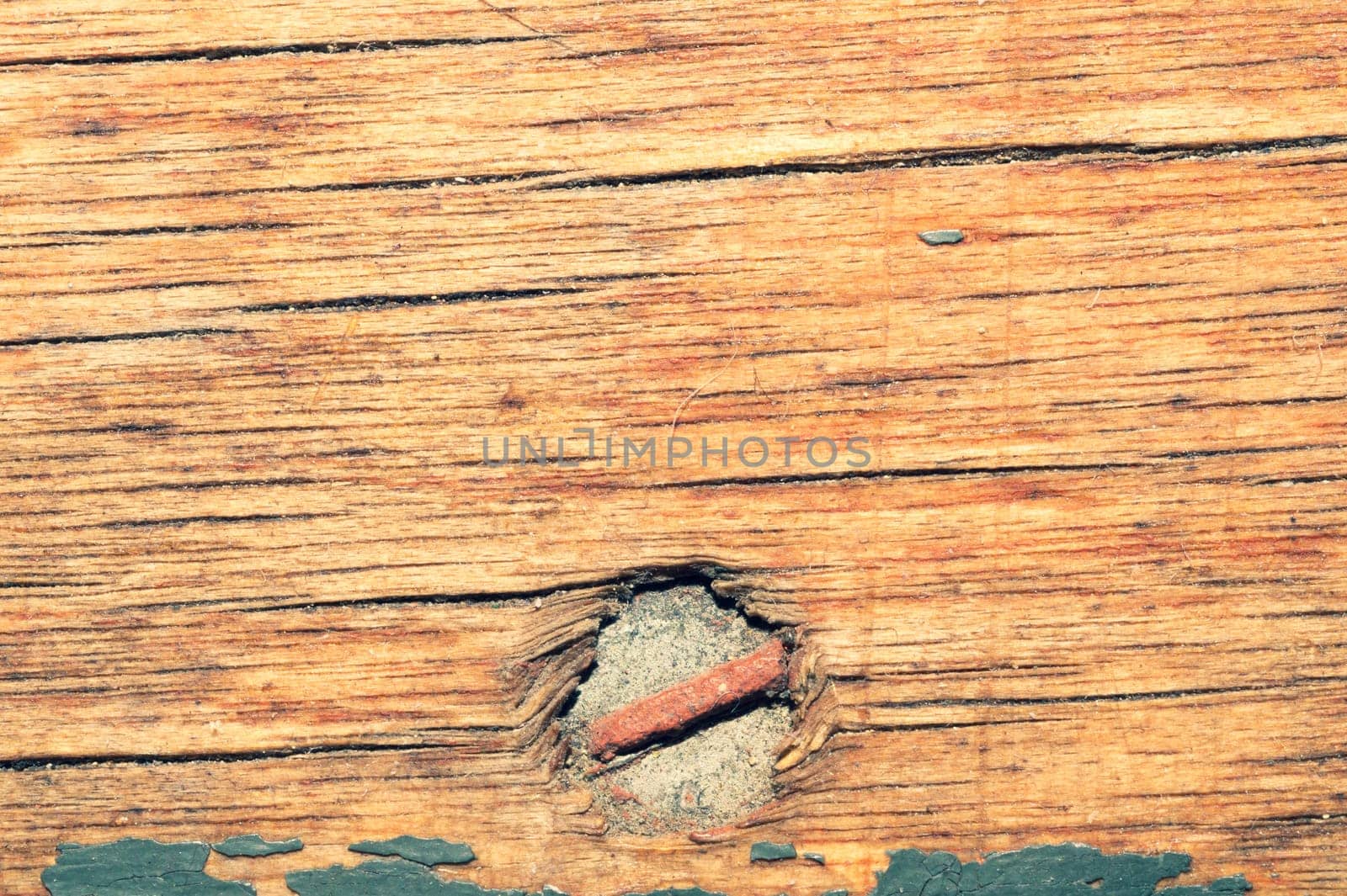 Wood background with nail. grunge wooden texture close up. old rough surface with scratches