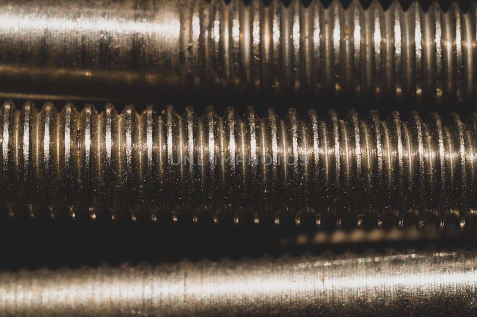 Steel screws close up. bolt thread. fasteners background. work tool