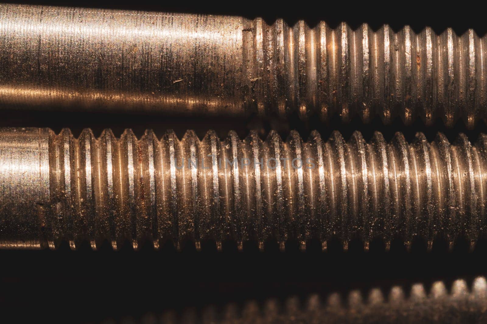 Steel screws close up. bolt thread. fasteners background. work tool