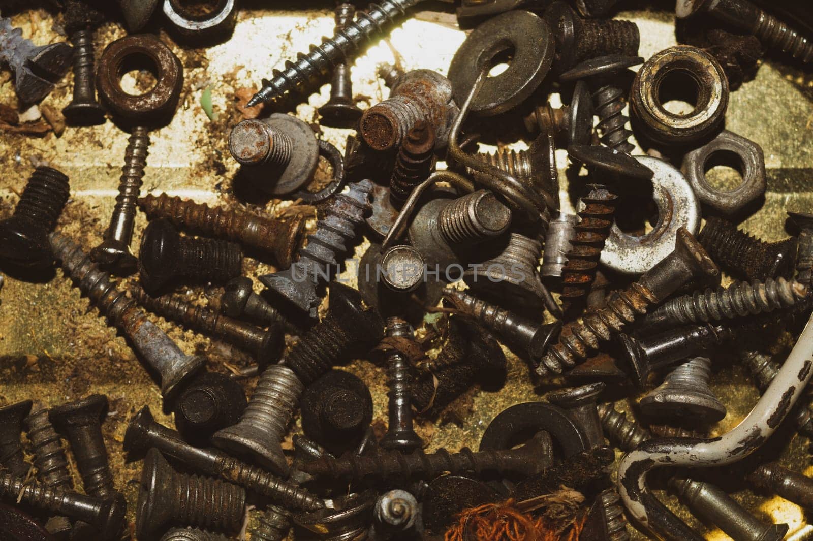 Screws background. heap of tapping screws. work tool. pile of fasteners