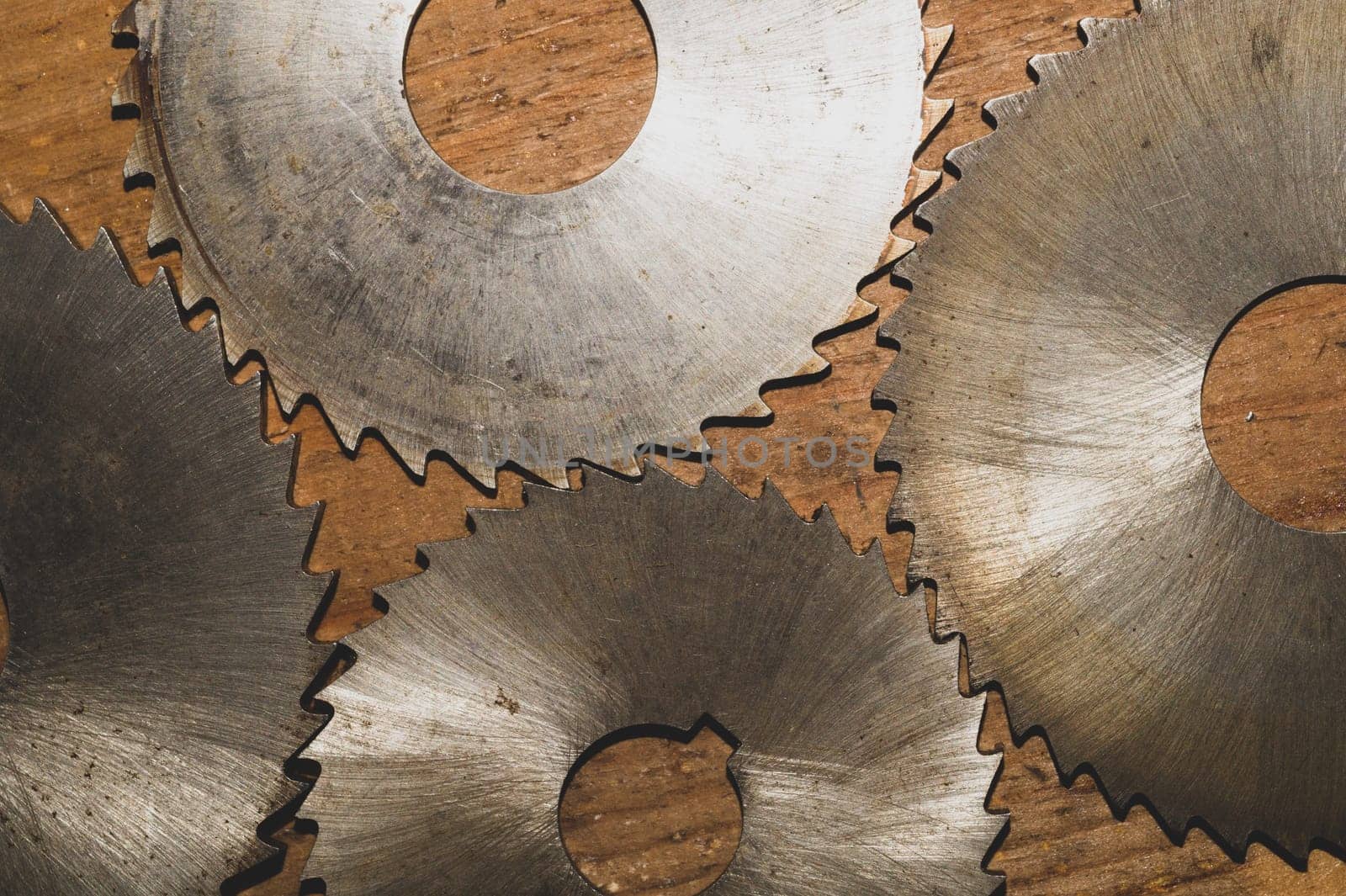 Circular saw blades. carpentry tools. industrial background. equipment for sawmill and sawing wooden products