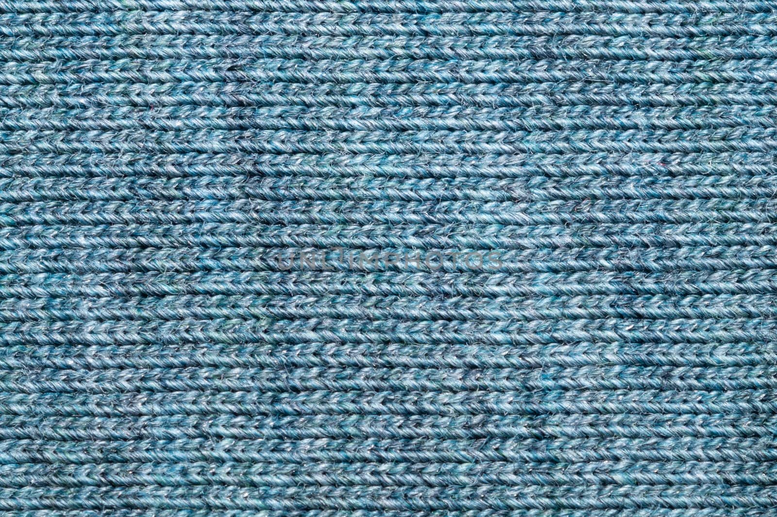 Fabric texture. woolen textile. knitted material close up. woven background