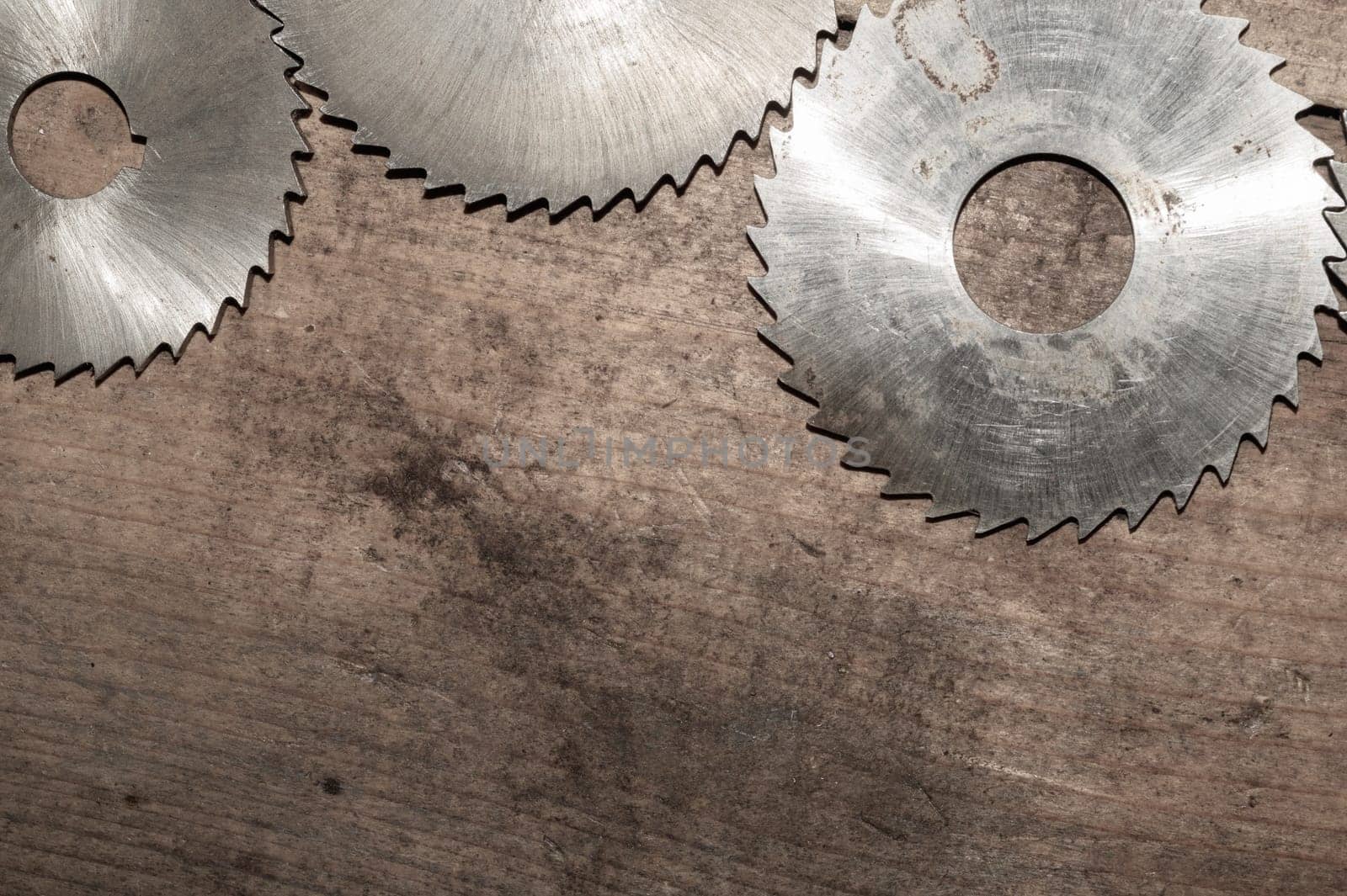 Circular saw blades. carpentry tools. industrial background. equipment for sawmill and sawing wooden products