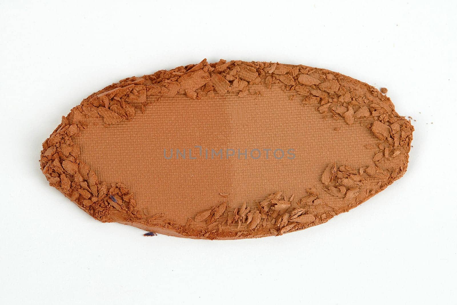 pressed face powder on a white background