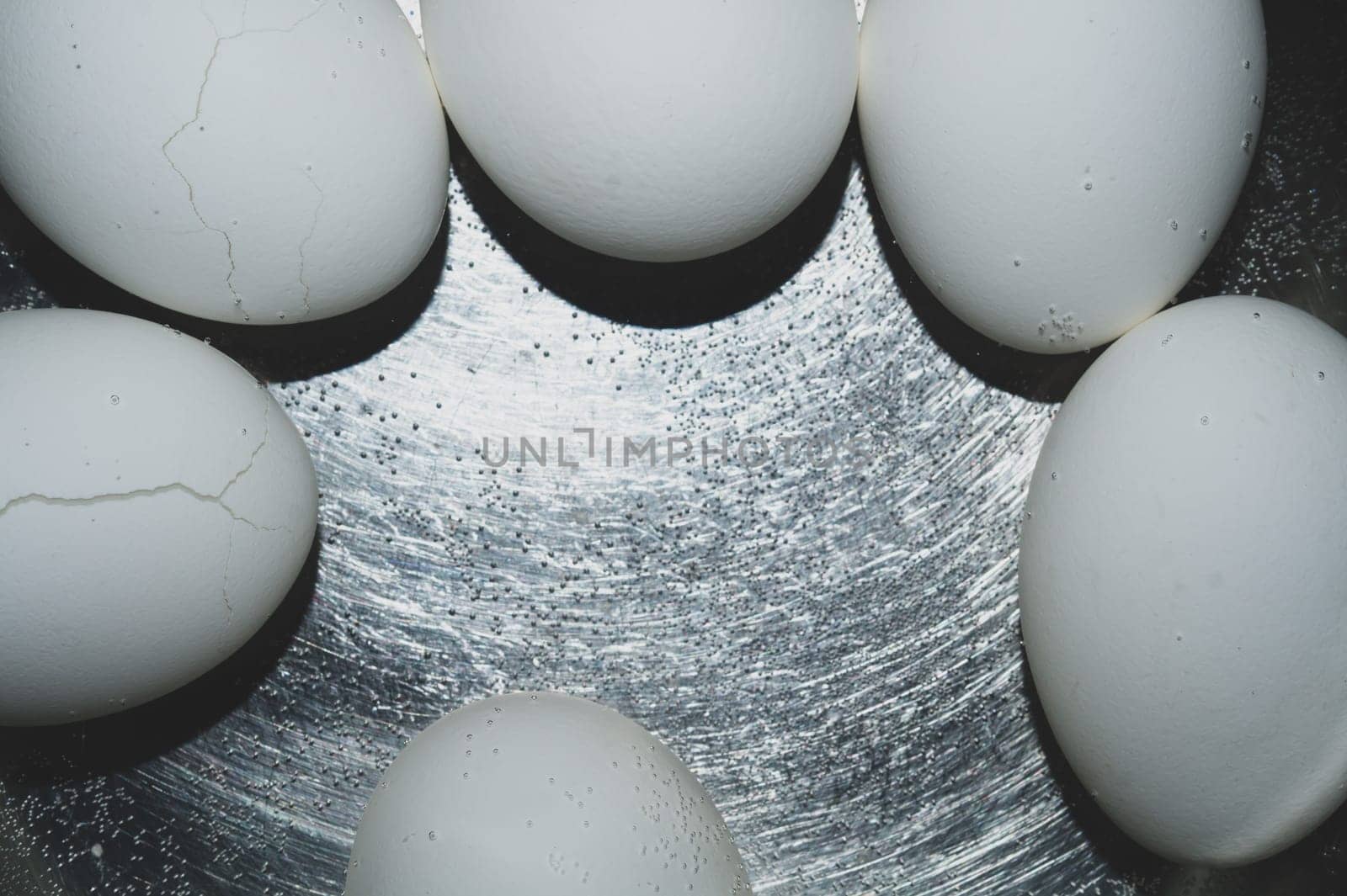 Eggs boiled in a pot with hot water