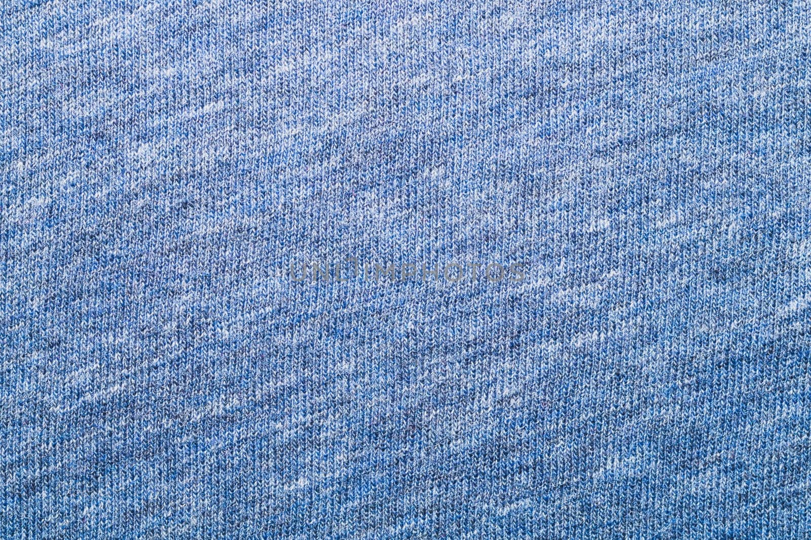 Fabric texture. woolen textile. knitted material close up. woven background