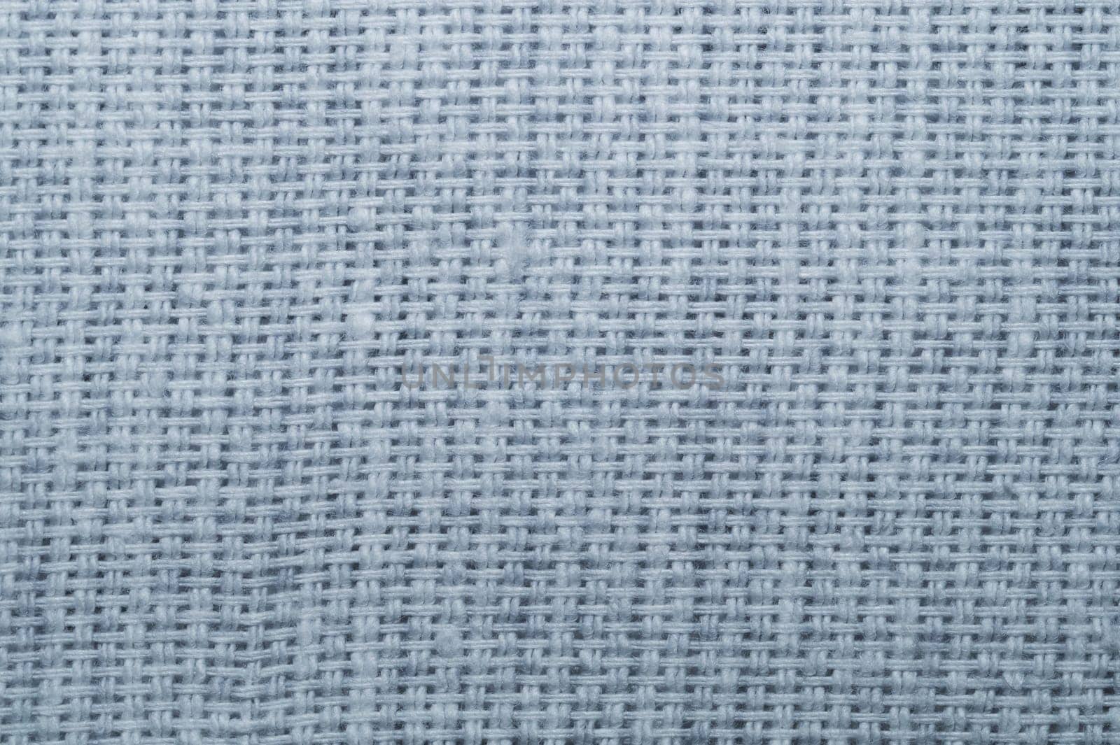Fabric texture. woolen textile. knitted material close up. woven background