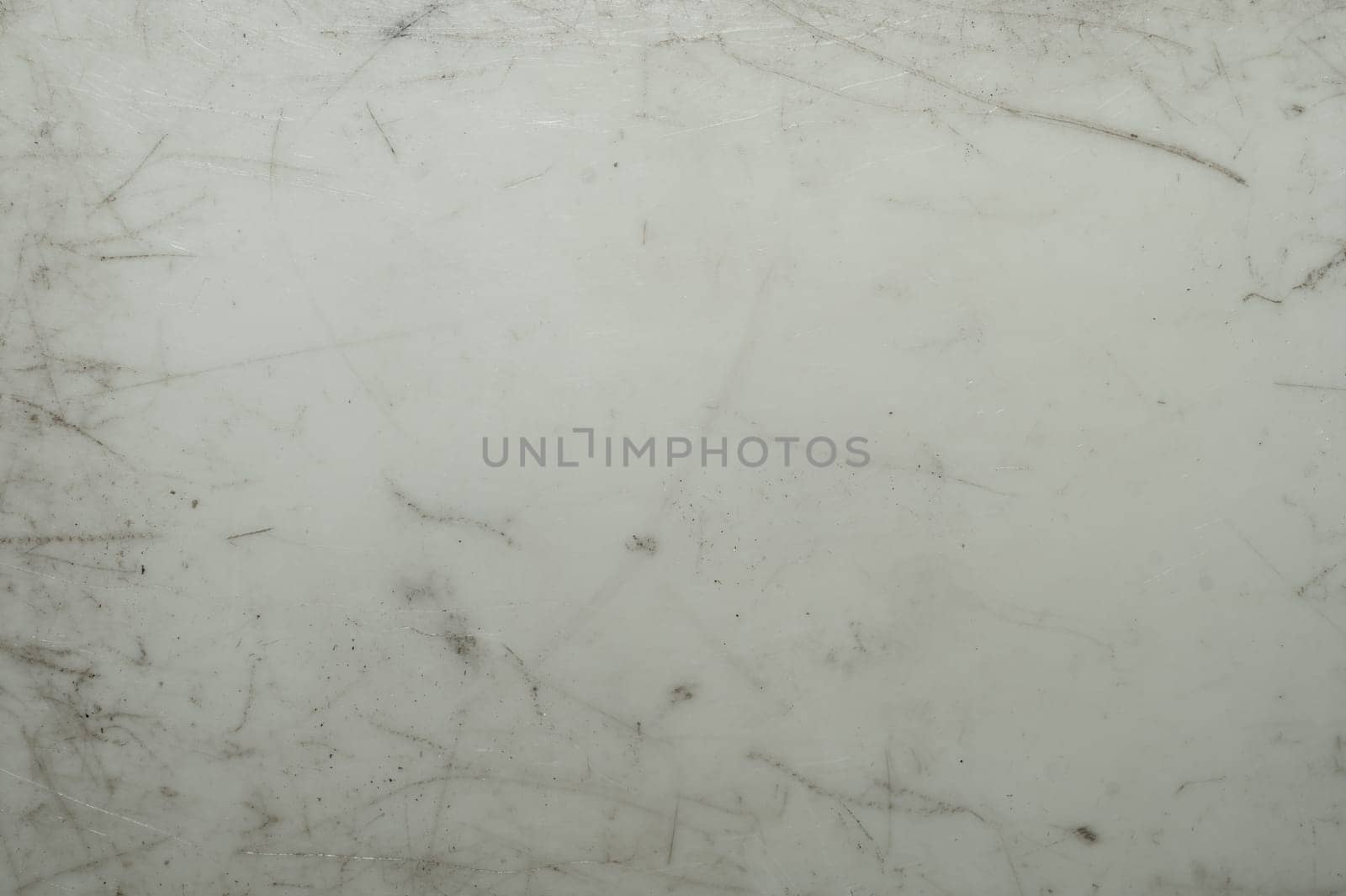 Scratched plastic texture. gray surface background