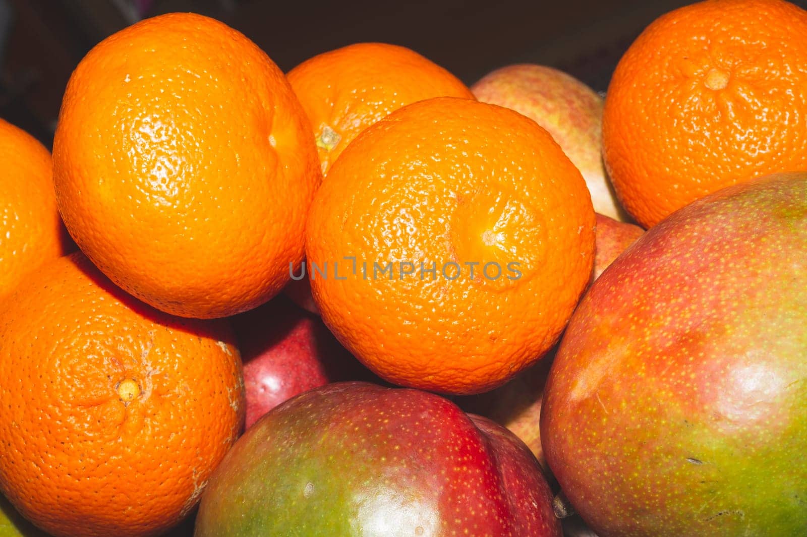 Mango and mandarins. natural looking fruits