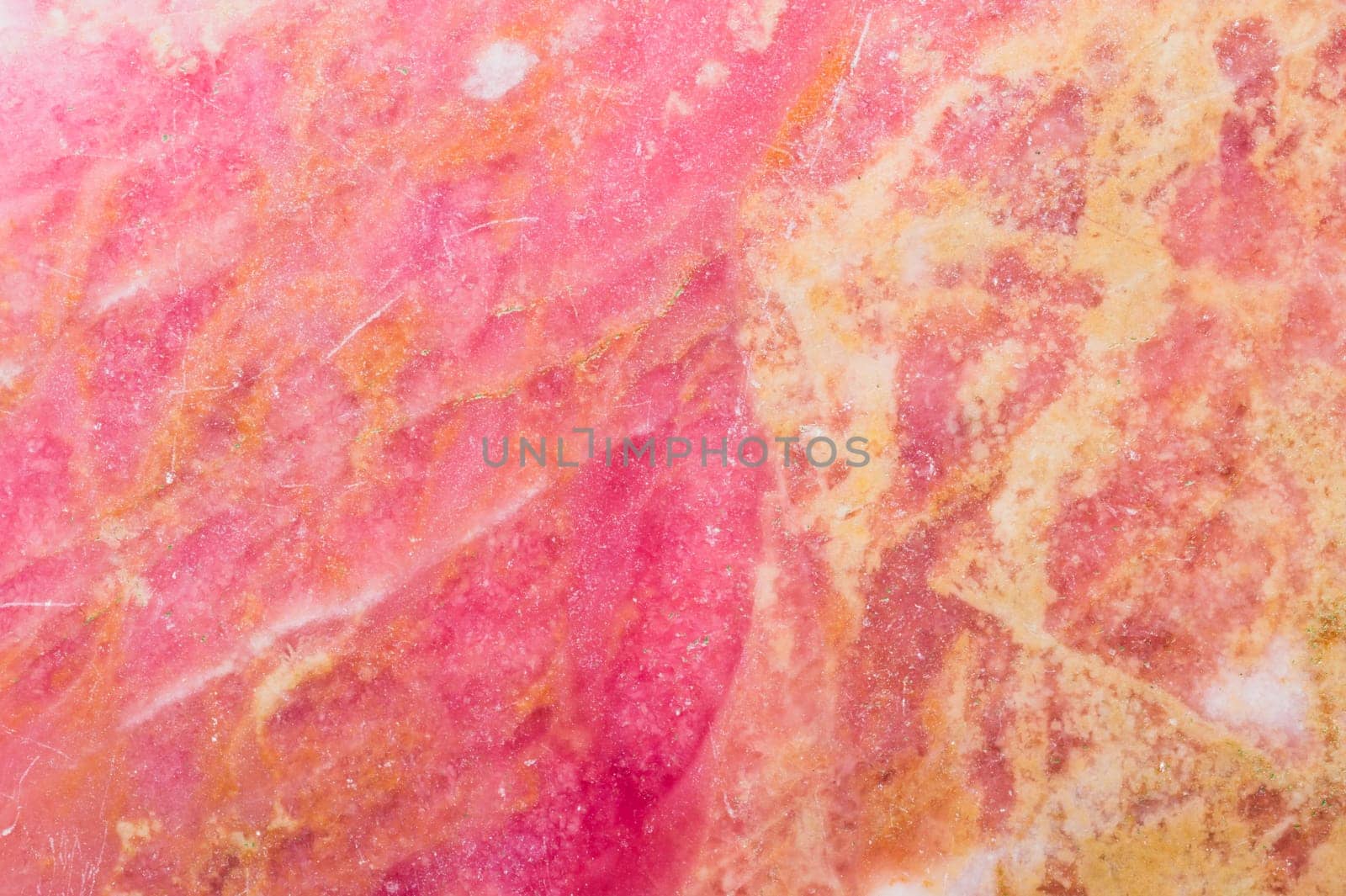 Red granite texture. pink marble background. flat stone surface close up