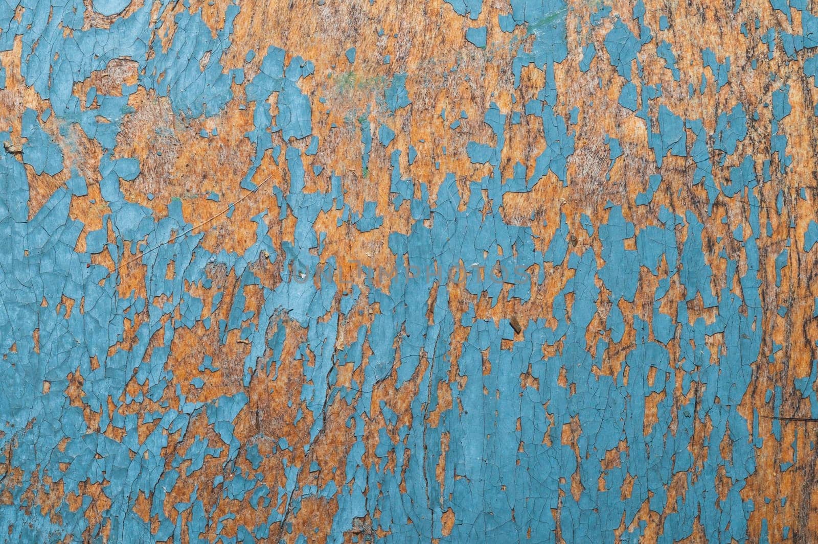 Seamless texture of shabby paint on a wooden surface. cracked wood background macro