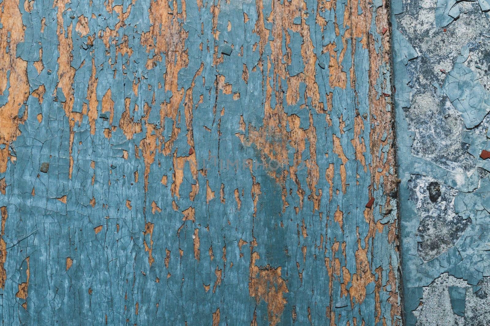Wooden texture with cracked paint. shabby wood background close up