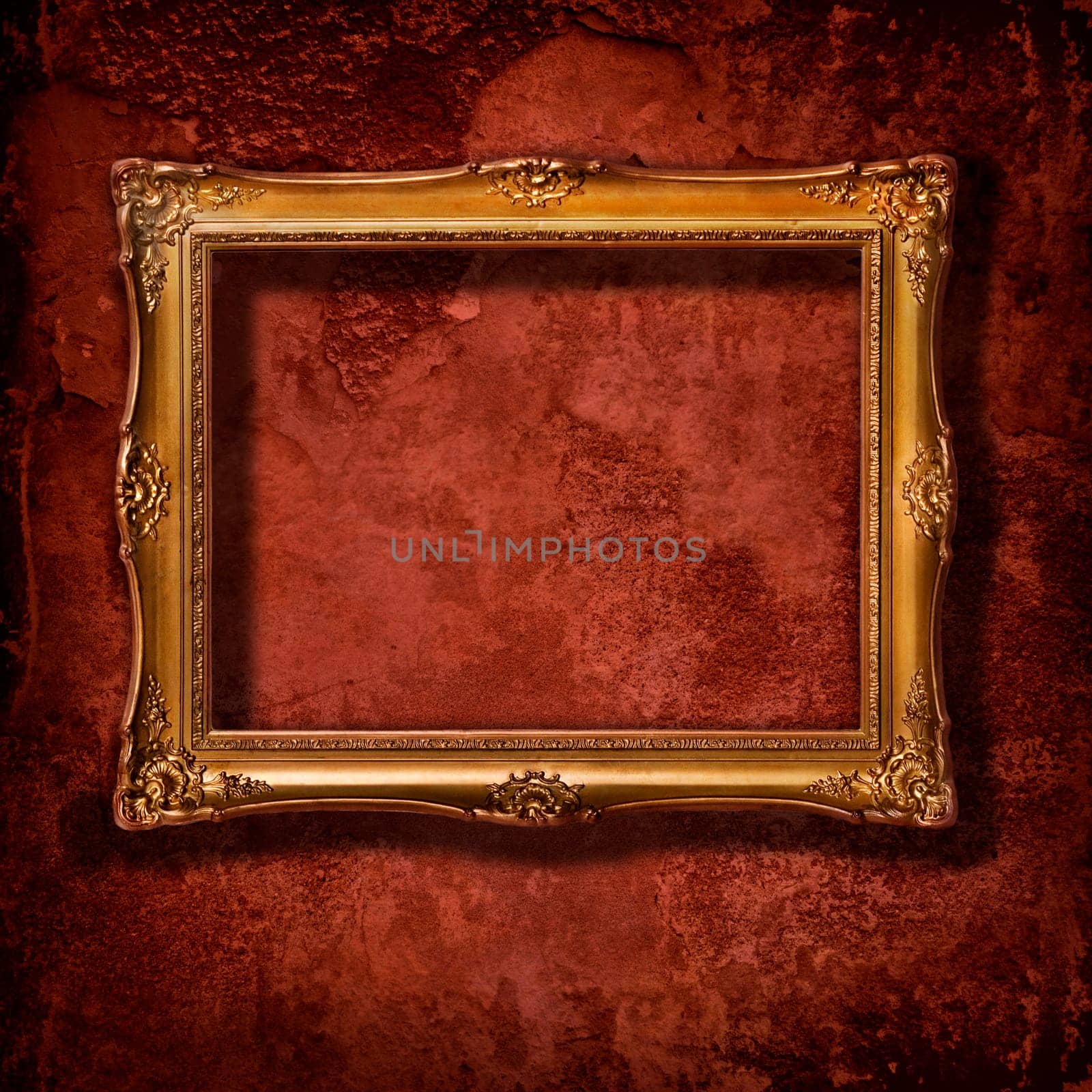 Vintage golden frame on grunge conrete wall