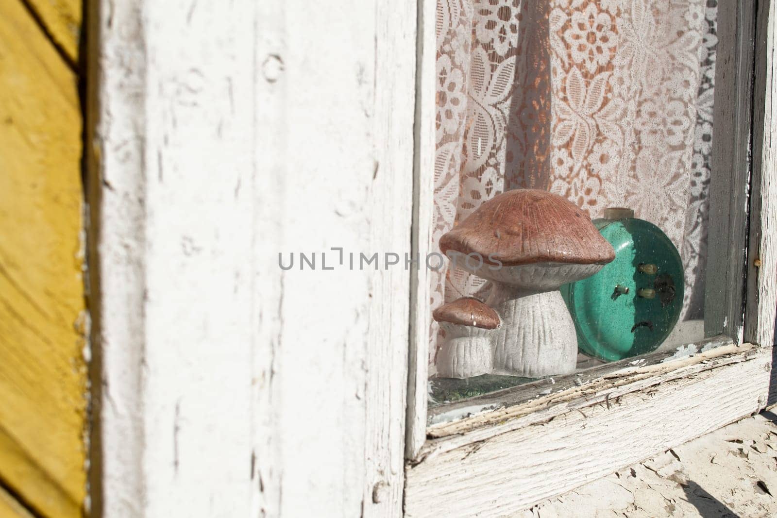 simple old window of old wooden house closeup